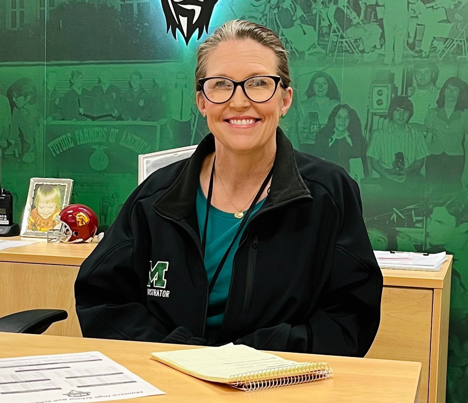 Taking the baton: Peterson named interim principal