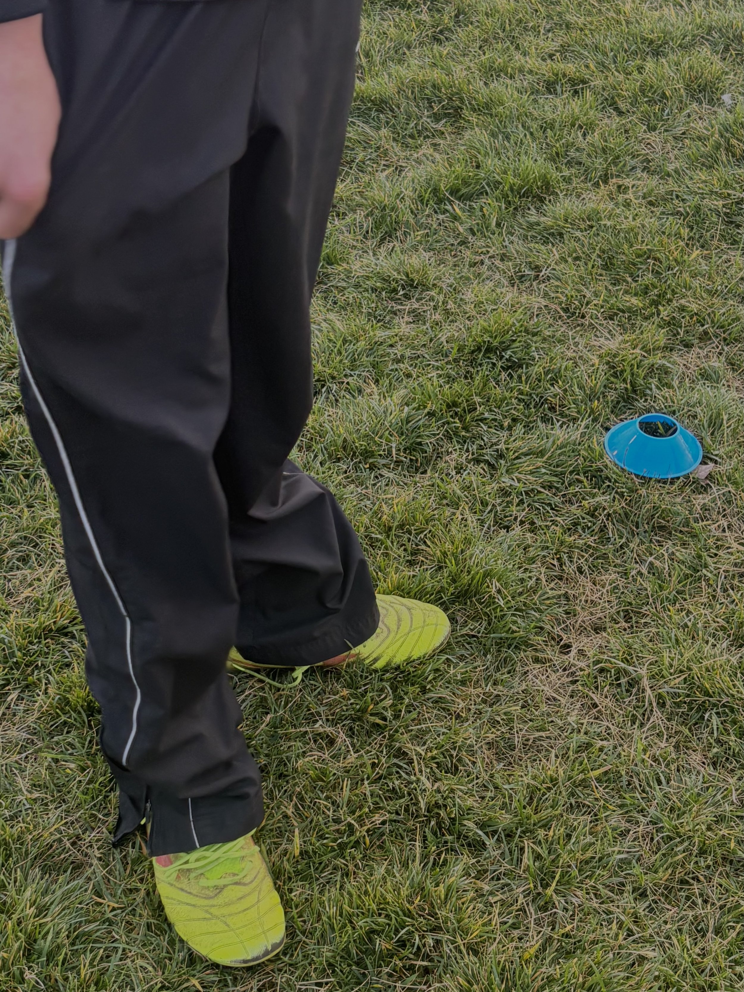  Mateo Esparza's cleats pop out with the neon greenish color during warmups against Mountain House for senior night, February 5, 2026. (Christian Ambriz/The tower)&nbsp;  &nbsp; 