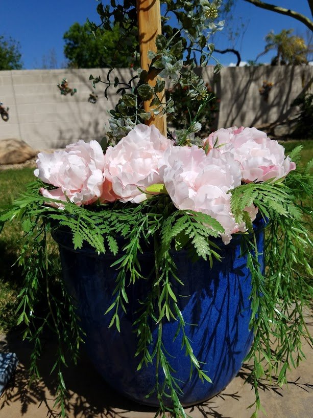 artificial flowers in pots
