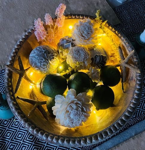 fairy lights in decorative wood bowl