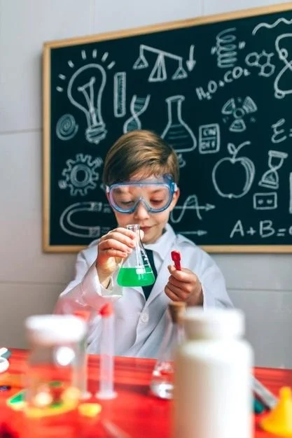 Boy dressed as chemist playing with chem….jpg
