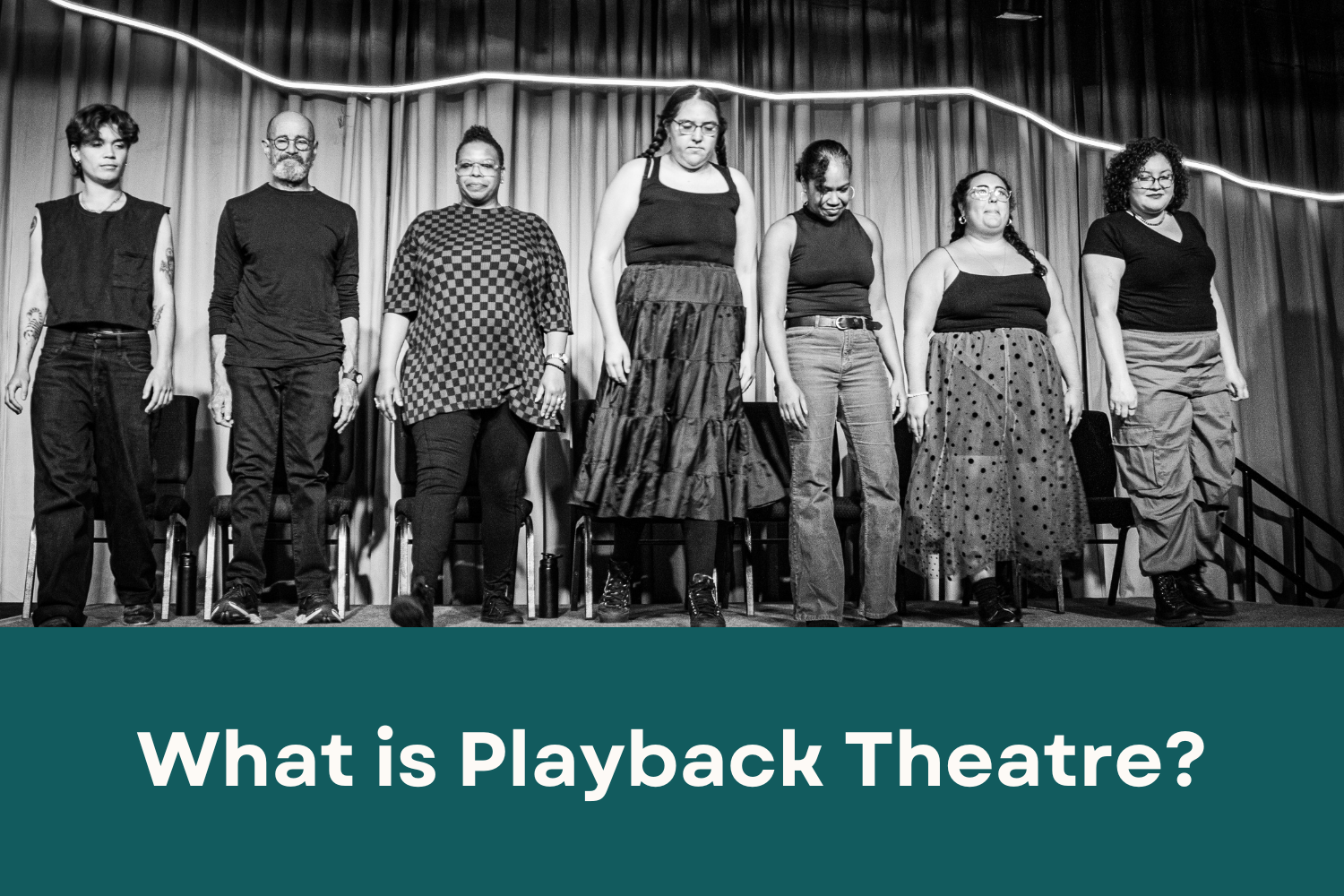 Actors on a stage with the text reading, "What is Playback Theatre?"