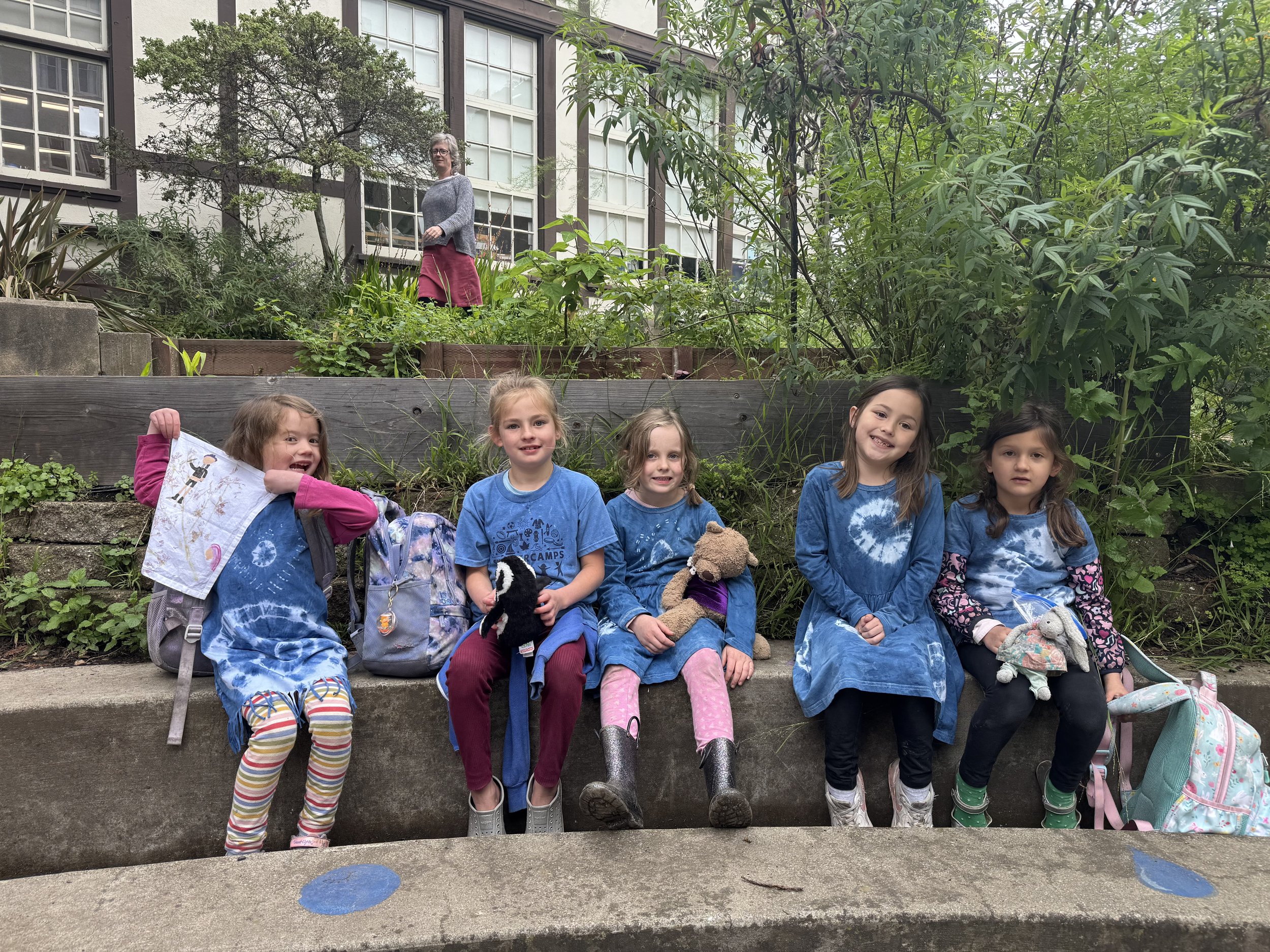 1st graders wearing their shibori-dyed shirts at the Plant Dyeing intramural