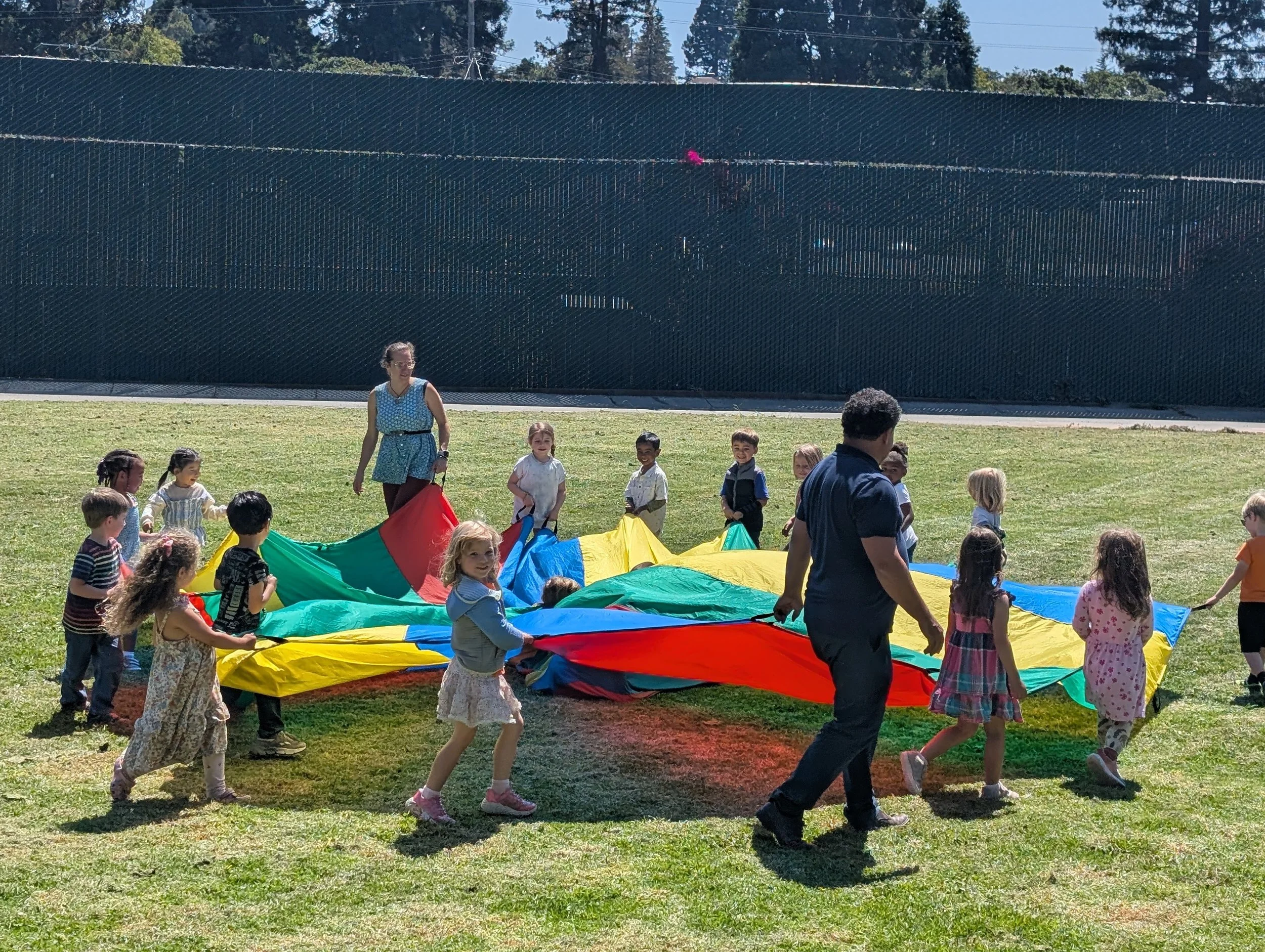 TK class enjoying parachute play