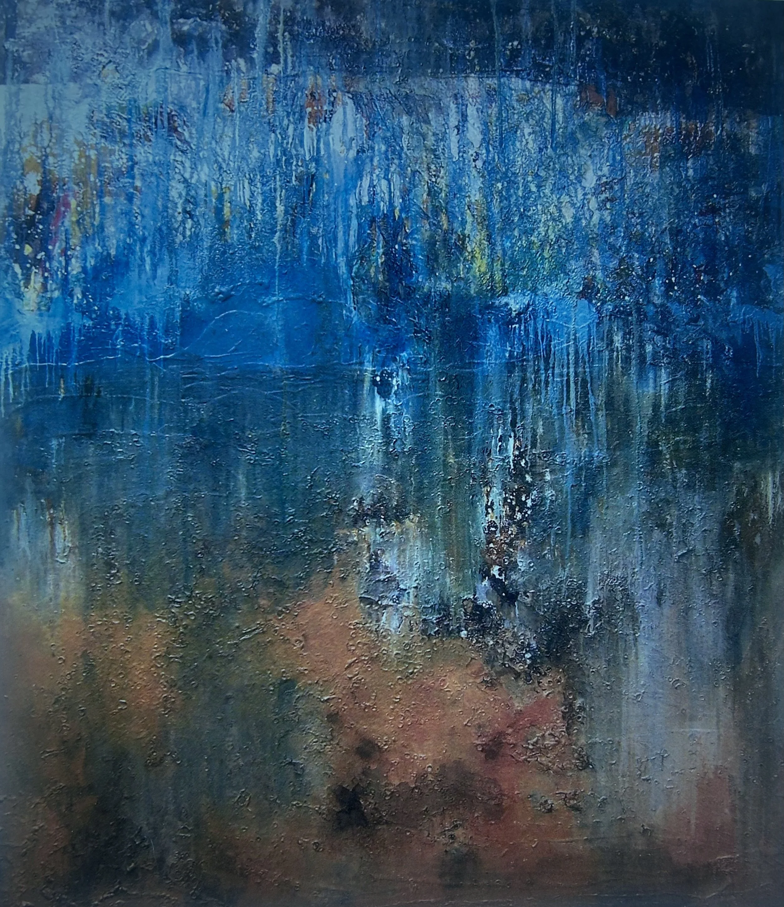 Abstract painting with textured surface featuring shades of blue, with hints of brown, black, and some multi-colored specks.