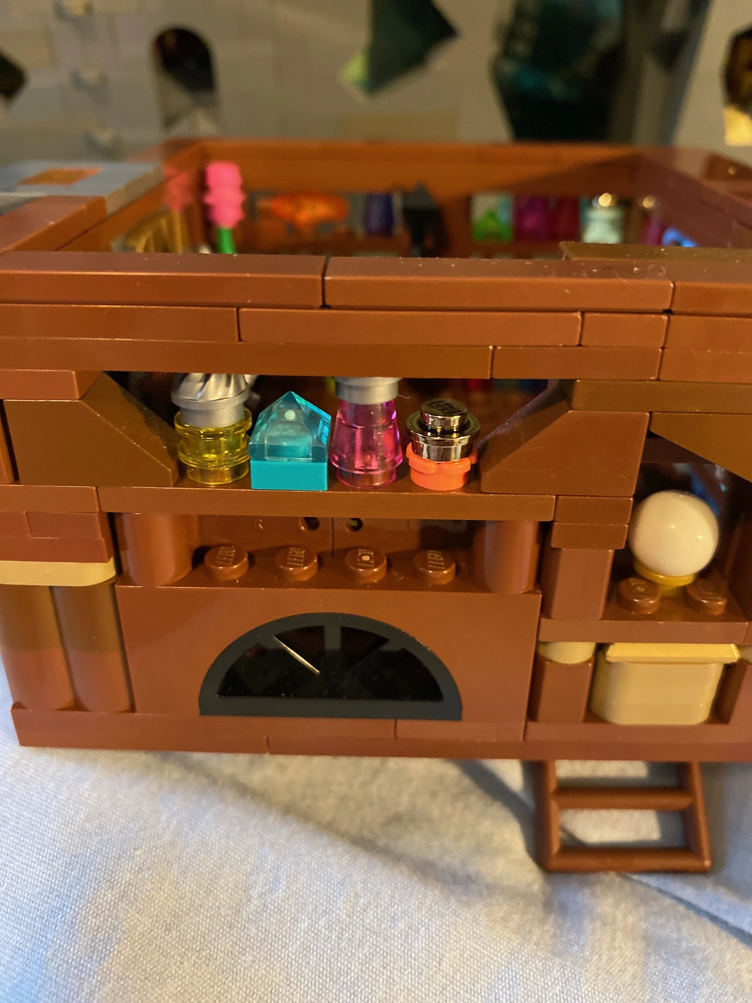 MOC Spotlight: “Wizard’s Cottage” by Connor McGrath Basement Shelves