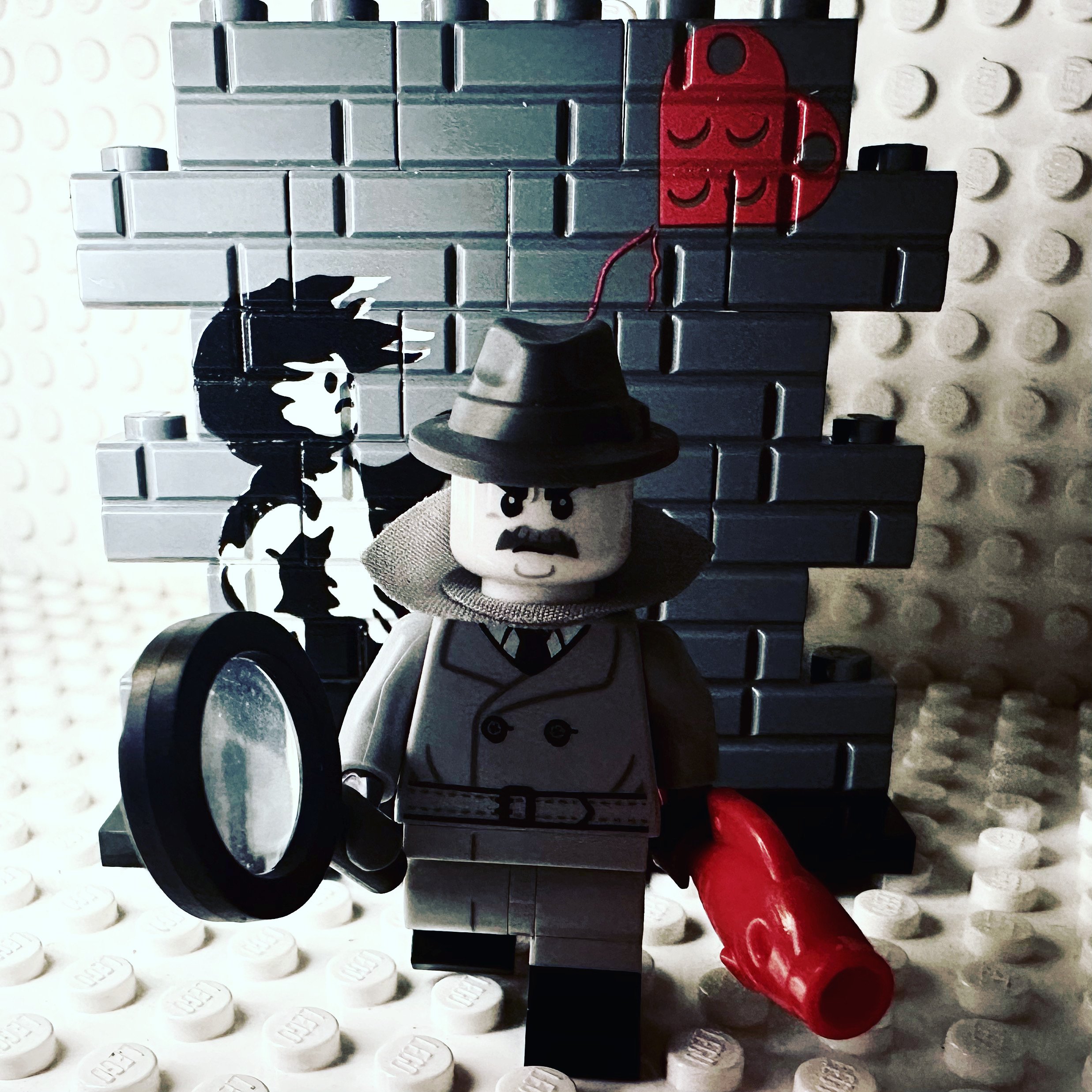 BuffaLUG Dives into the Fun: LEGO Collectible Minifigure Series 25 Review. Noir Detective Noir Detective: This guy is so simple; it's actually wonderful. The black and white (ok grey) look for this character is something fresh and new. The red fish gets a chuckle and gets scenes for habitat building running through my brain. And his hat looks amazing, and apparently, as I'm typing, I guess I'm partial to mustached figs.