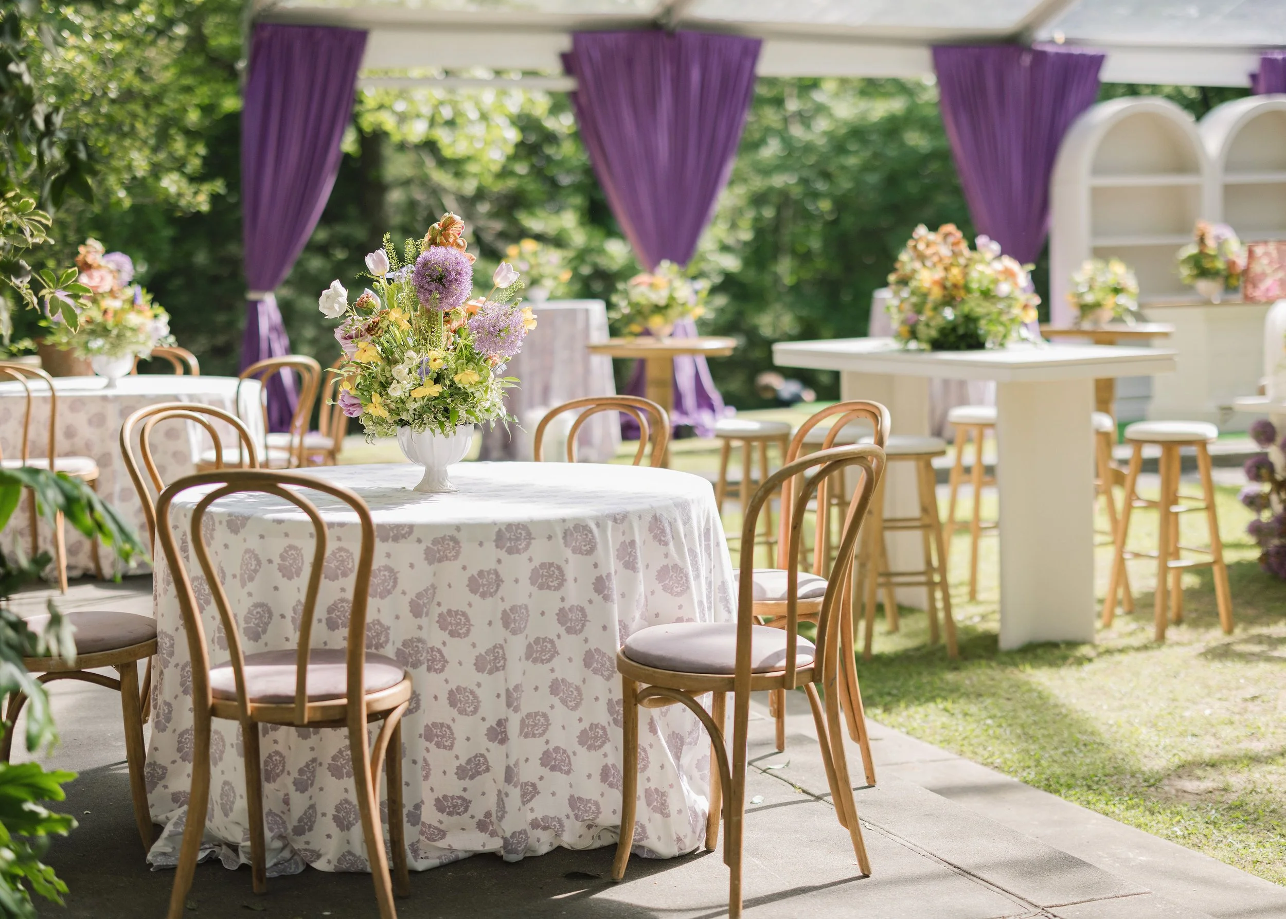 Luxury wedding reception design with natural wood dining chairs at Field and Forest in Mississippi. 