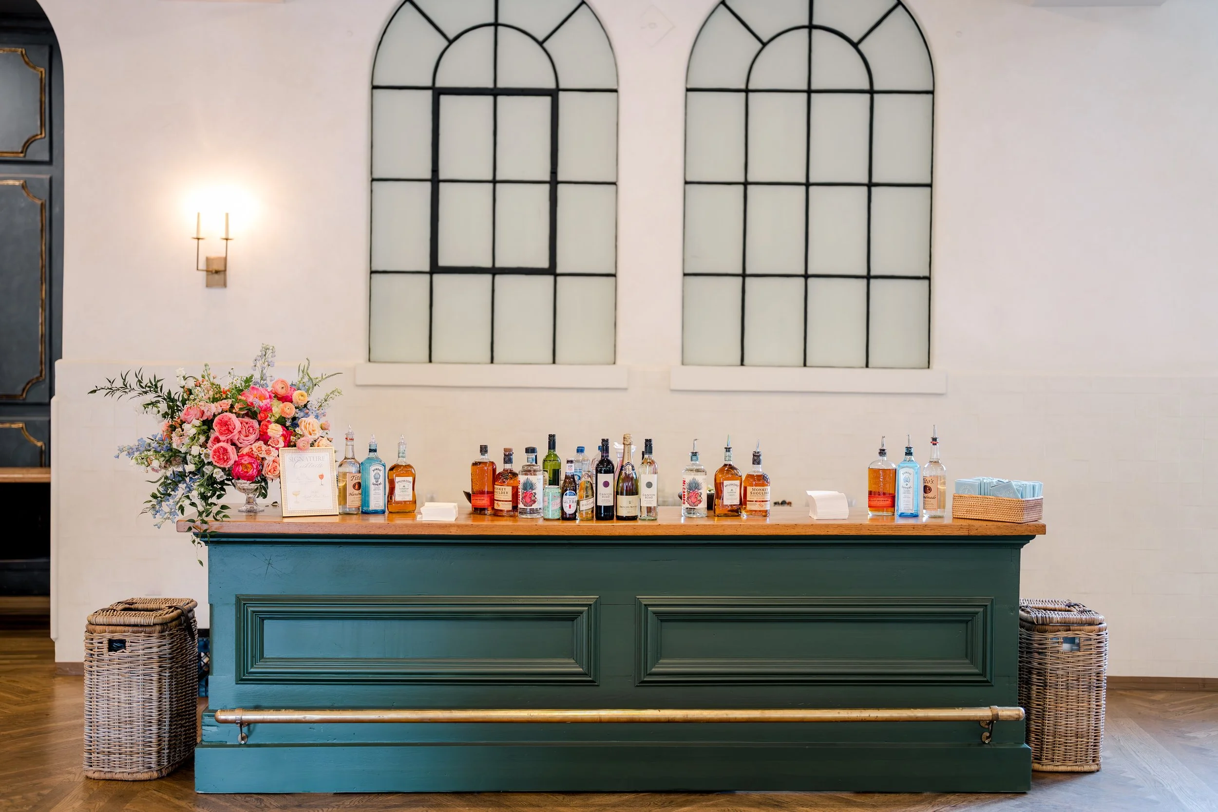 A wedding reception vintage green bar at Il Mercato in New Orleans. 