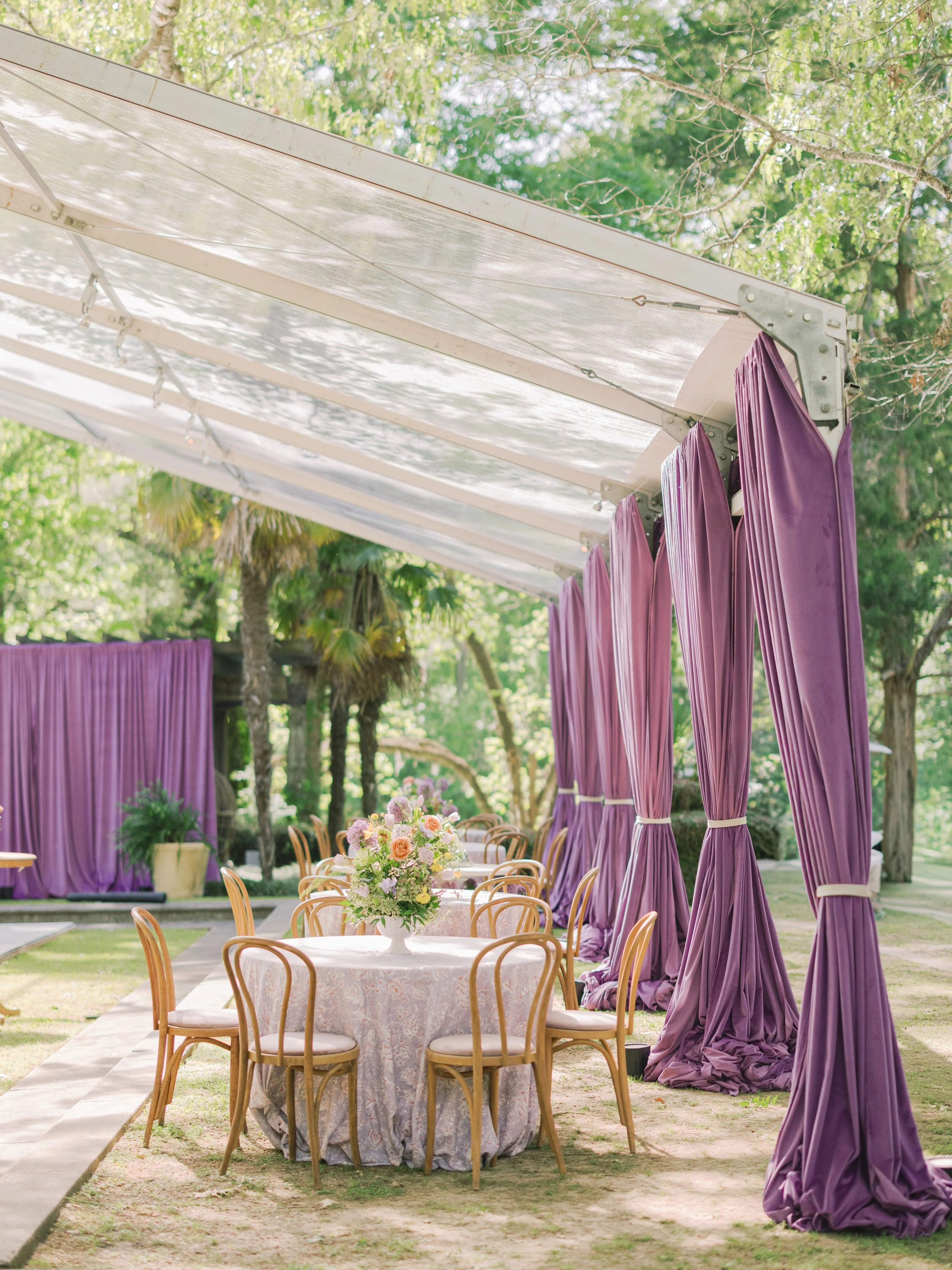 Luxury wedding reception design with natural wood dining chairs at Field and Forest in Mississippi. 