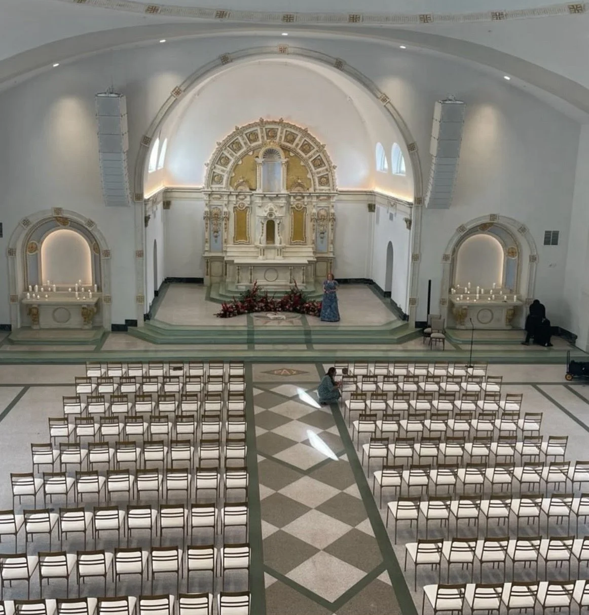 A wedding ceremony at the Josephine in New Orleans with gold modern dining chairs.