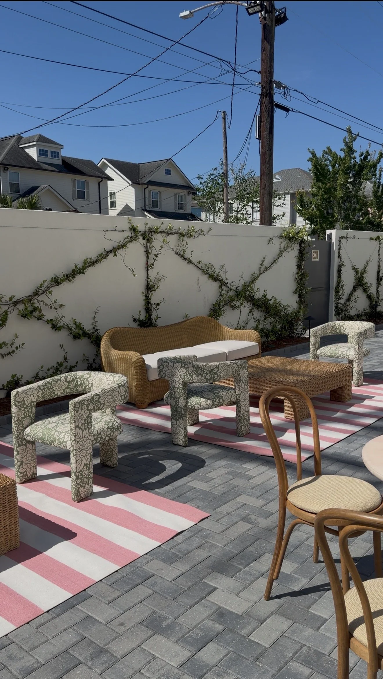 A outdoor wedding reception with a double large lounge at the Josephine in New Orleans.