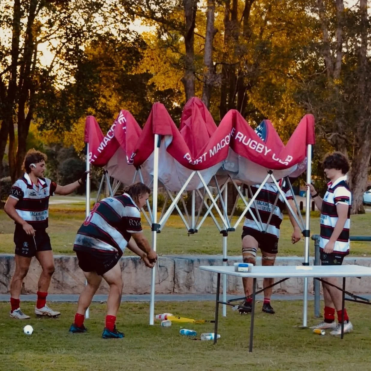 Plenty of great photos taken on Saturday by Trina and there will be plenty shared but this one just hits home.
After two incredibly physical matches, the senior men helped pack down the field bringing in and stacking away chairs, tables, tents, post 