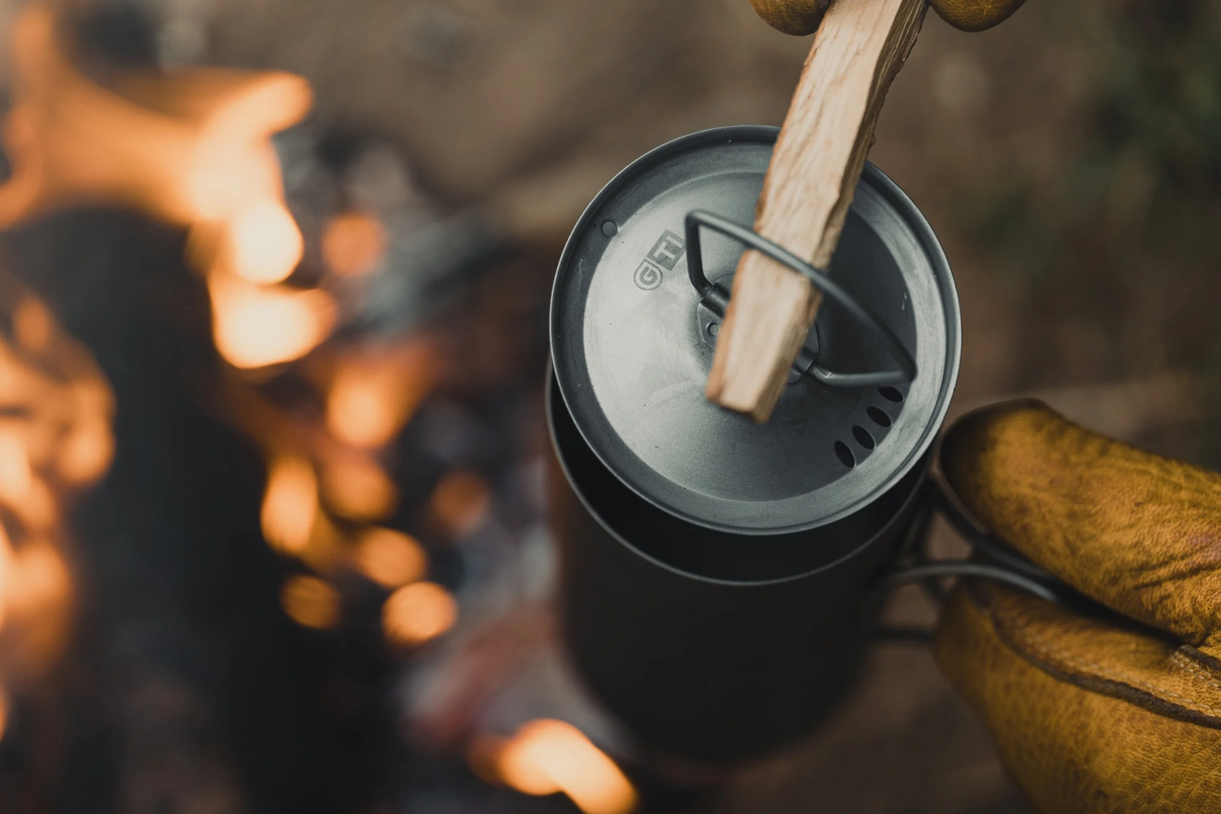 Grayl Titanium GeoPress outer cup used for boiling water on open fire