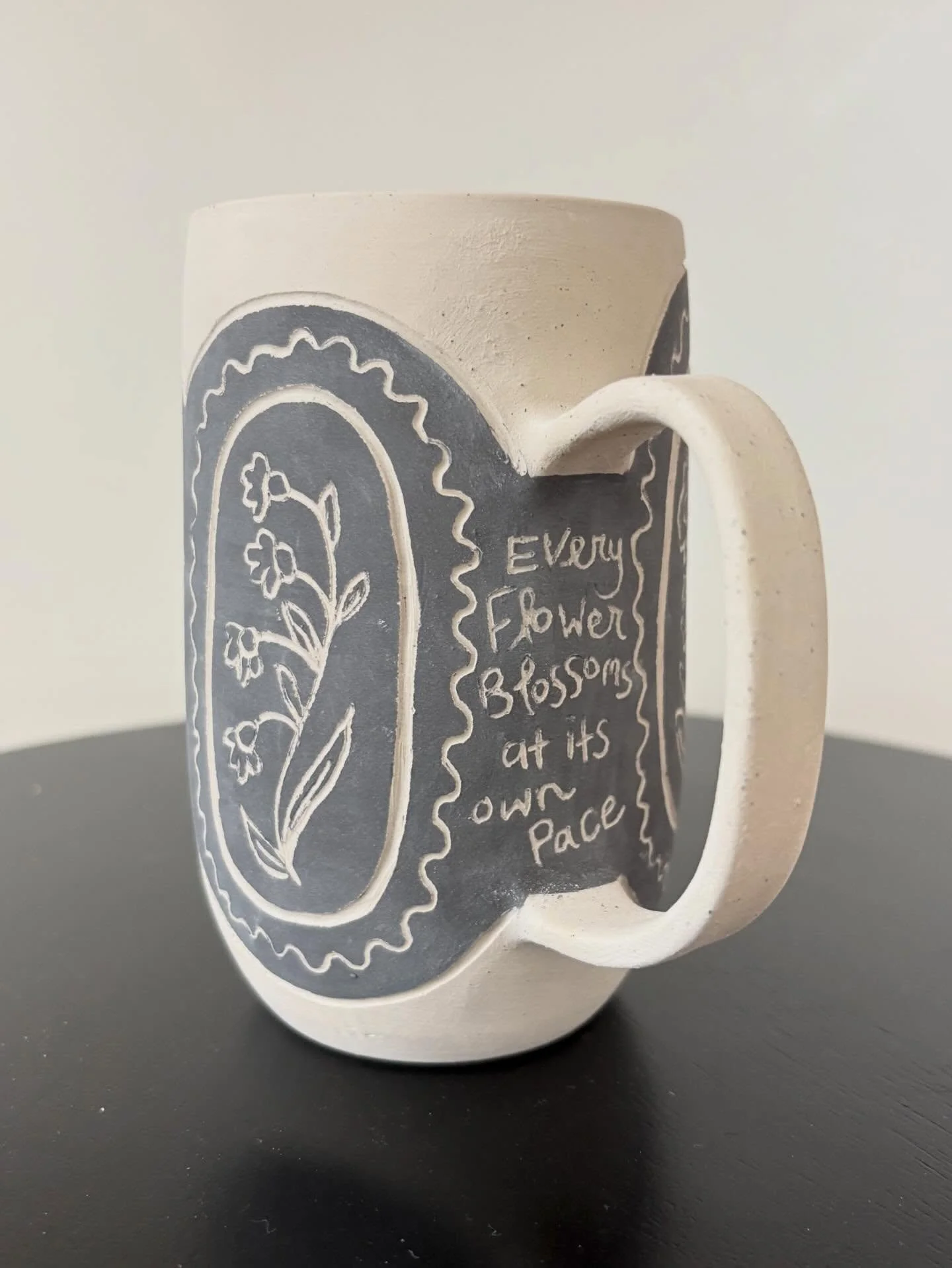 A little study in sketching on greenware and trying new things. At first, I left the area empty where the quote sits and looked at it for a bit before deciding to add words that would warm my heart up. It feels tucked away where only the person using