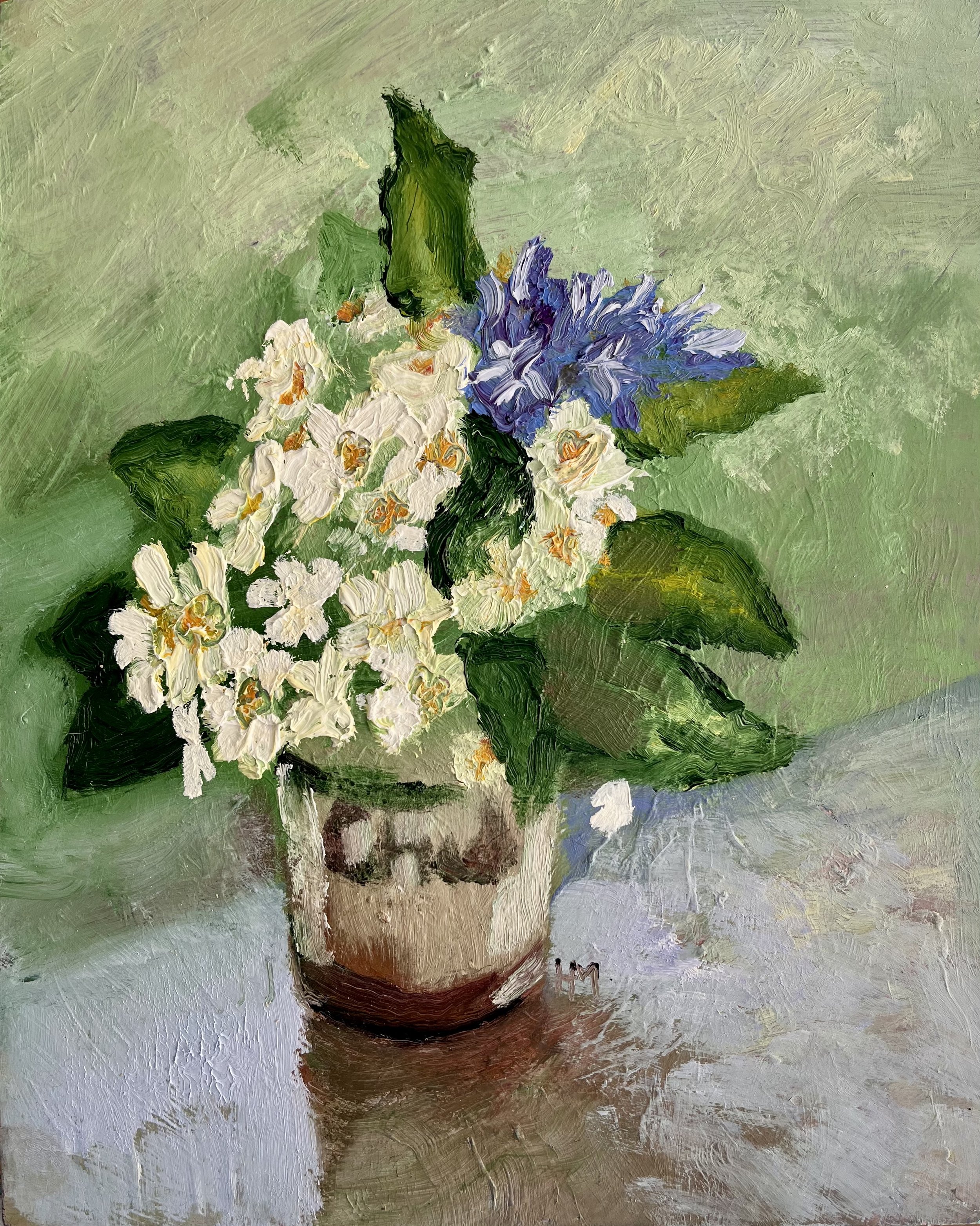 The original art oil painting shows a vase of primroses and a bluebell stem  wuth a grass background