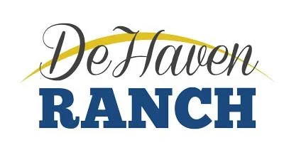The logo of De Haven Ranch featuring elegant script for 'De Haven' and bold uppercase for 'RANCH' with a yellow swoosh above.