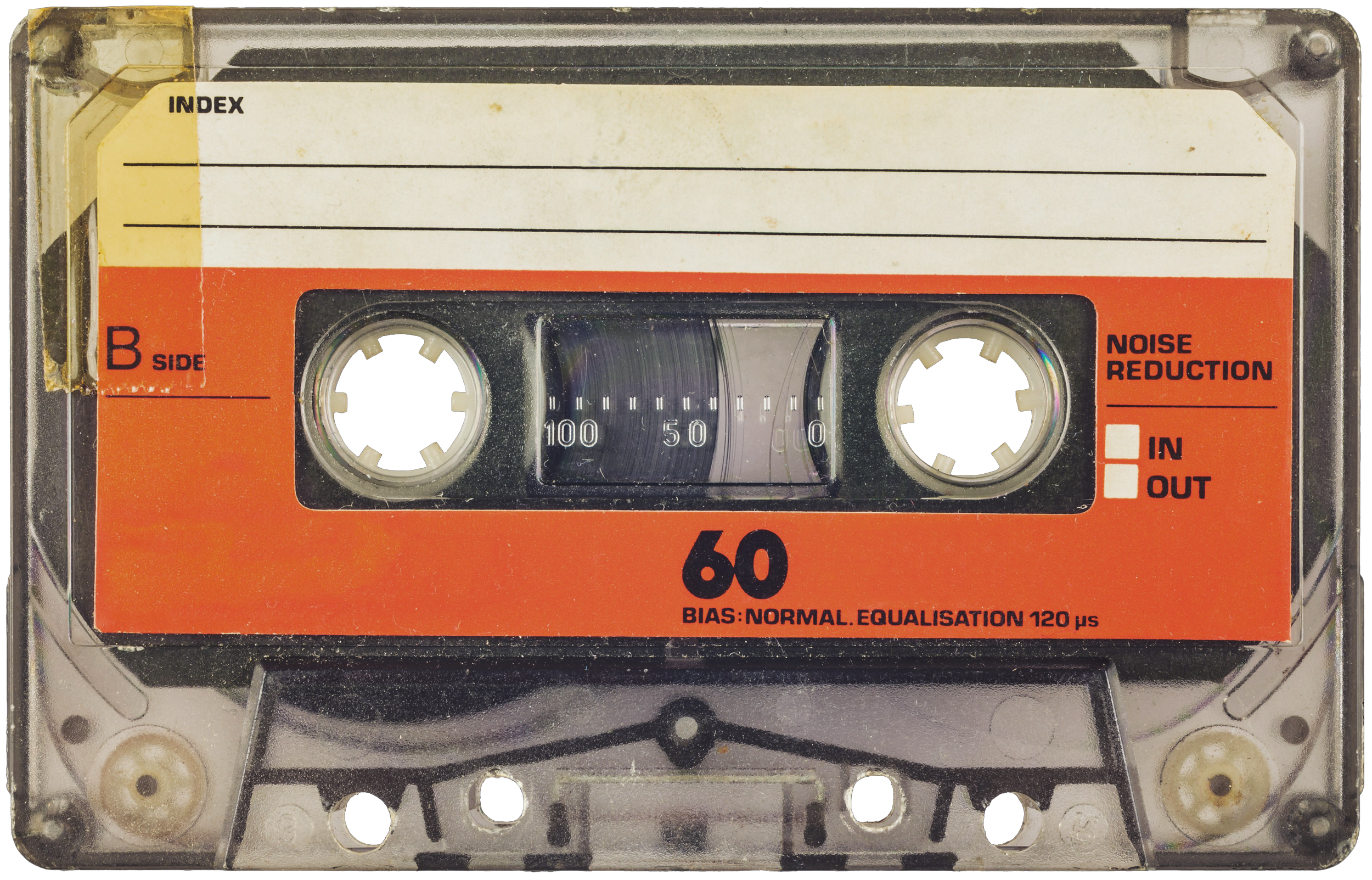 Vintage cassette tape with a red and orange label, showing "B Side," a 60-minute duration, and noise reduction options. Worn edges suggest nostalgia.