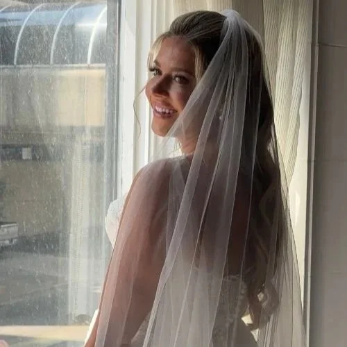 woman smiling bride with veil