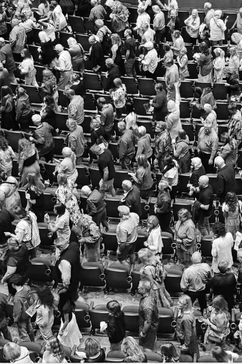 people leaving concert