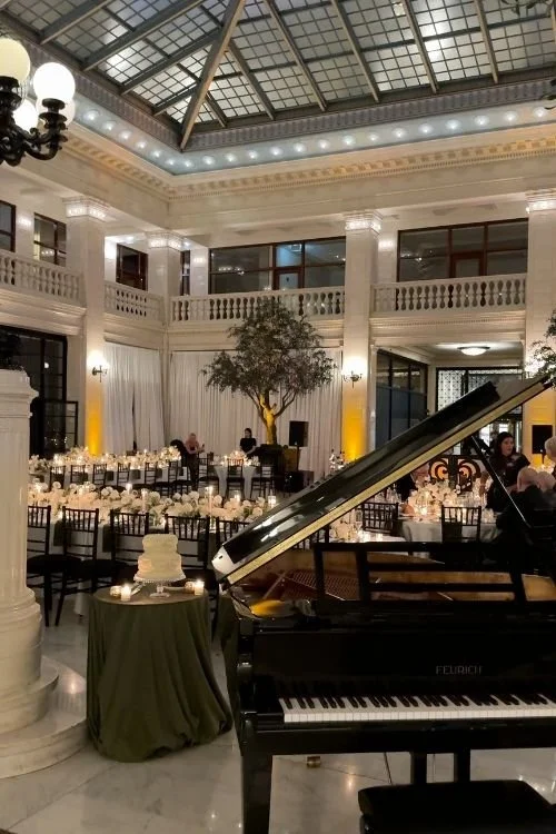 Grand Ballroom for Wedding Piano Long Tables White Columns The Exchange Chicago Wedding Reception