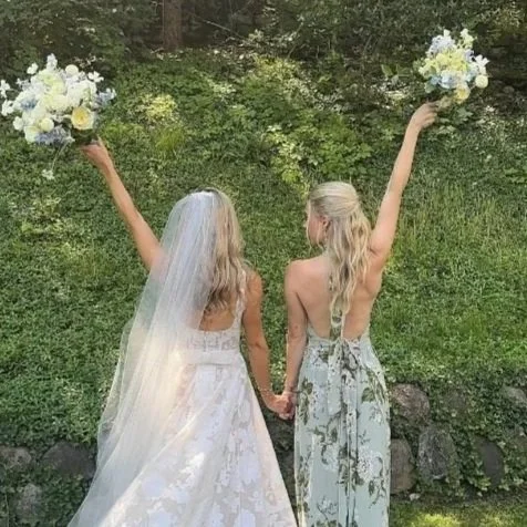 Bride and Maid of Honor Holding Bouquets