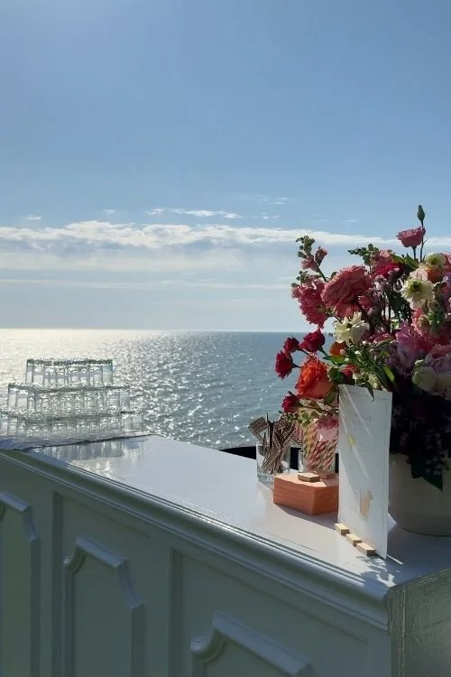 white bar with floral accents on lake michigan