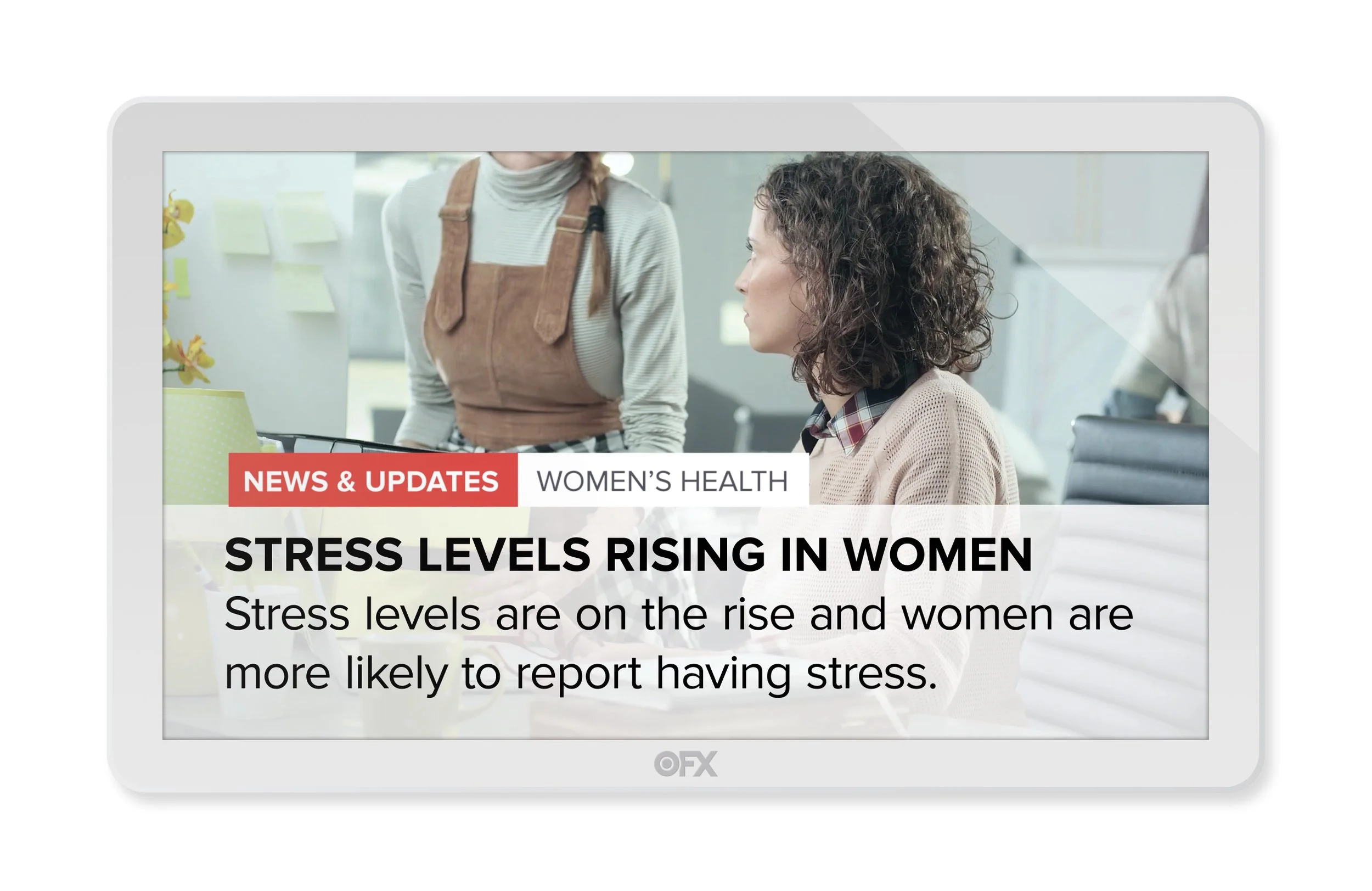 Tablet screen displaying news about rising stress levels in women, showing two women in a discussion