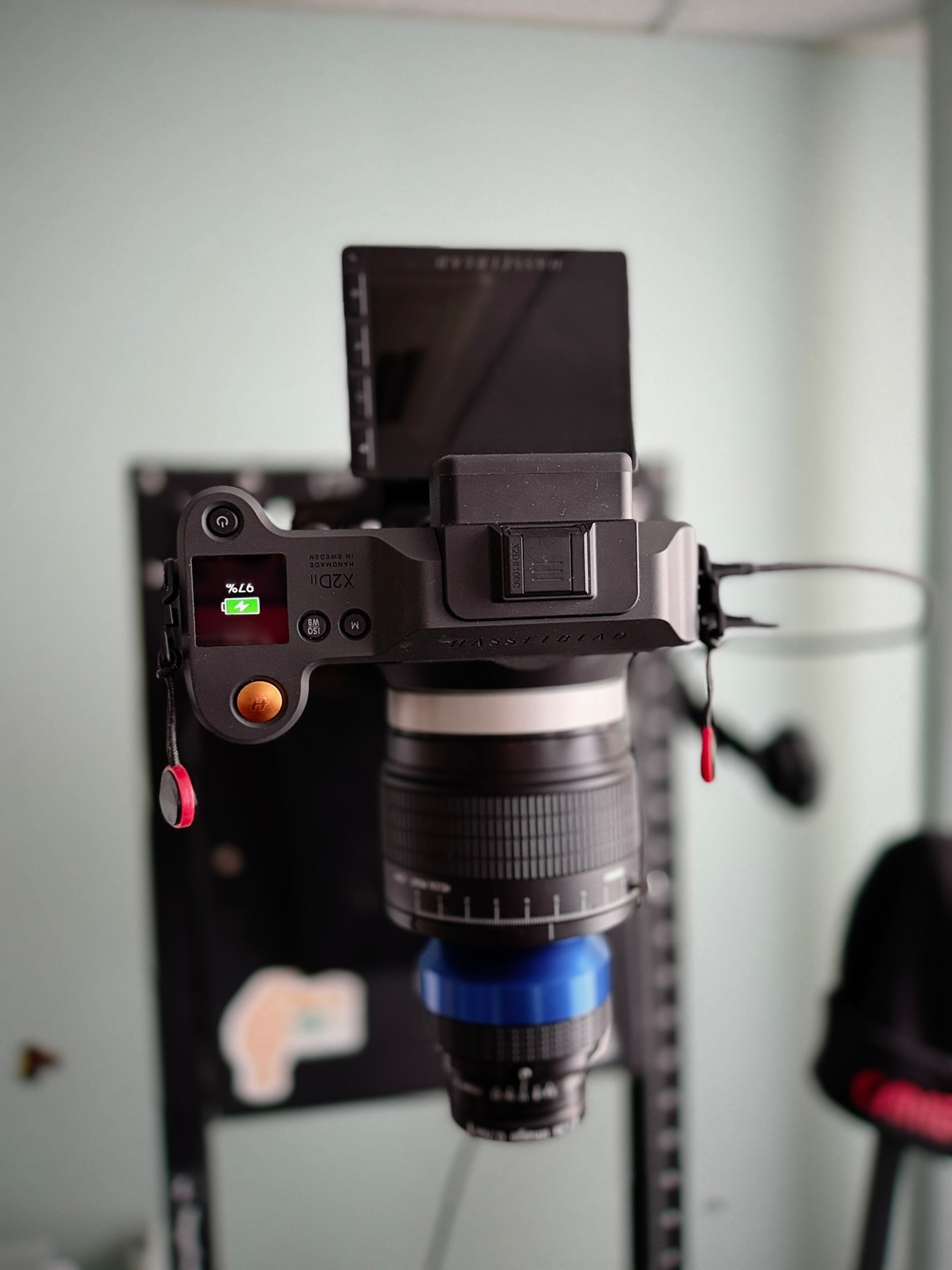 Scanning with the Hasselblad X2DII and the Cambo repro system.  We laser align the lens with the scan platform and use a glass carrier to ensure perfect flatness.  The heart of it is the legendary Linos Inspec 105/5.6 industrial scan lens.
