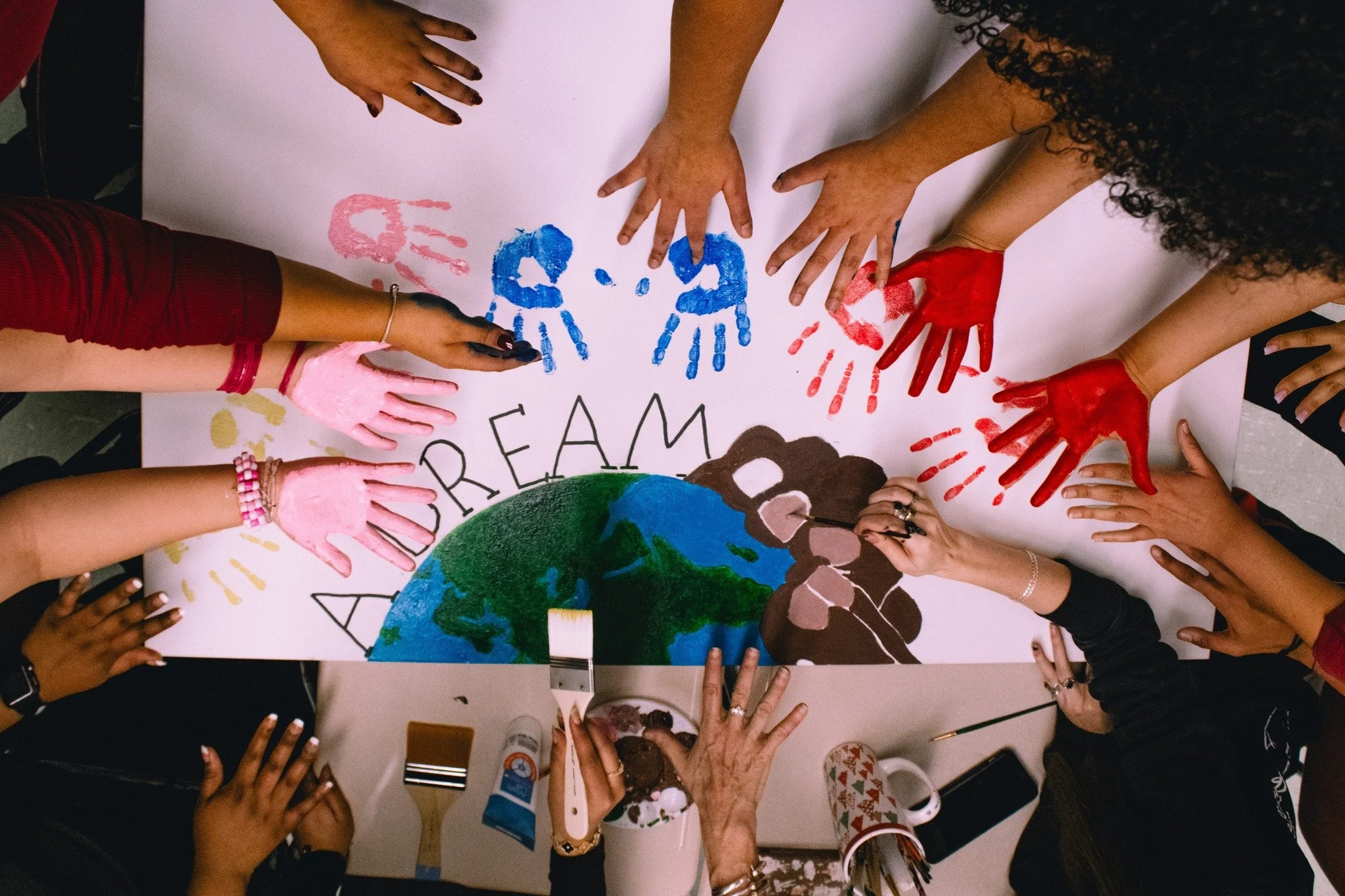 As a part of the MLK Coalition, NHCJE facilitated the production of this mural for this year's MLK Day Celebration, painted by Manchester Memorial High School's Open Minds in Action Club (OMIA- @omiammhs), of which NHCJE intern Ayvah Collier is found