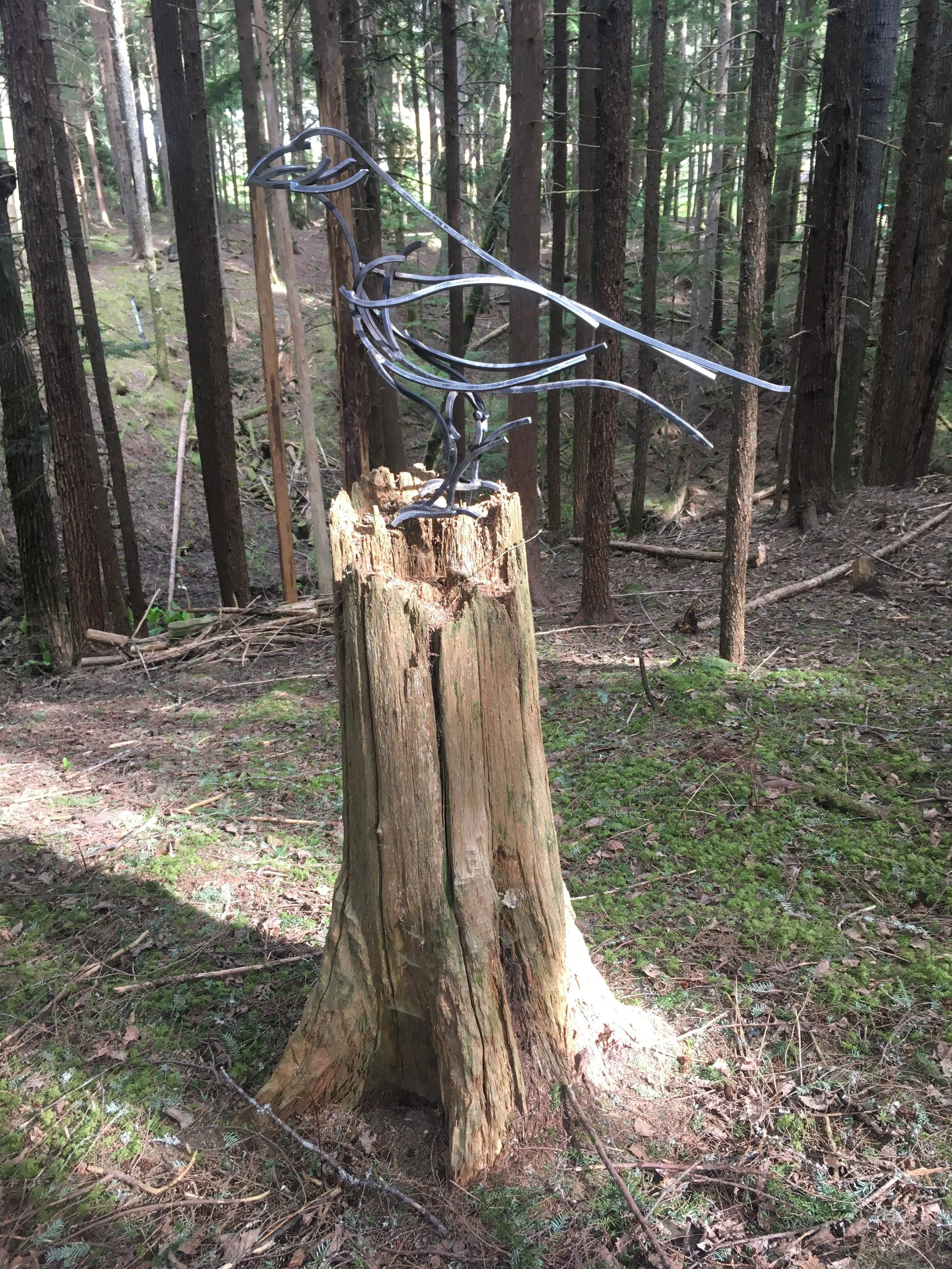 Bird Sculpture in the forest