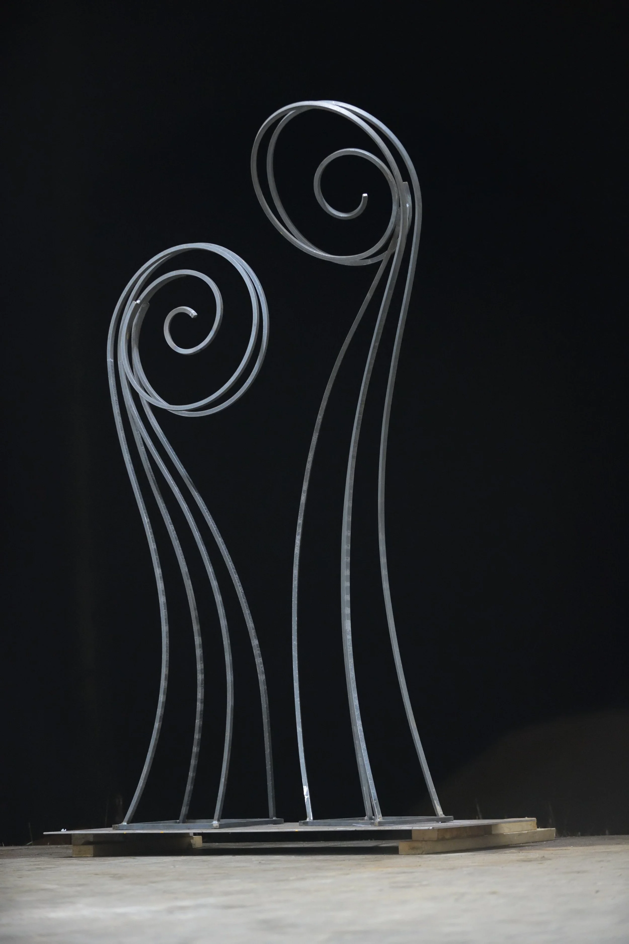 cortex steel fiddlehead sculpture