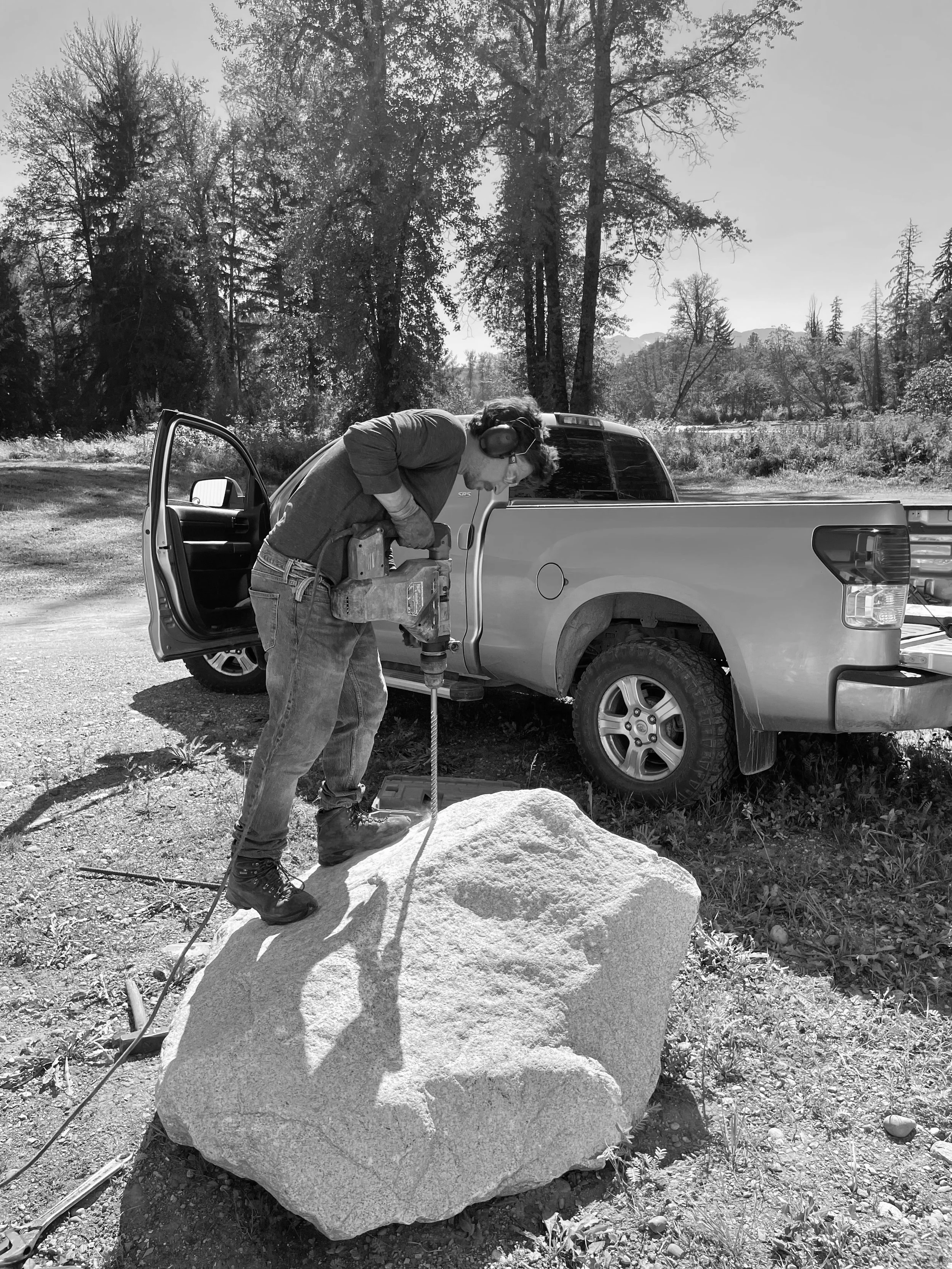 drilling granite boulders to accept steel sculptures
