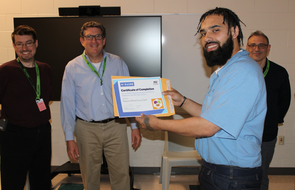  Student Kasene receives his certificate 