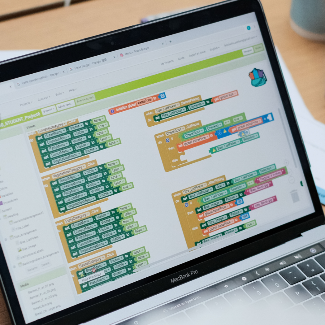 Closeup of App Inventor block code on a laptop