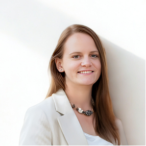 Caitlin Wild in a suit