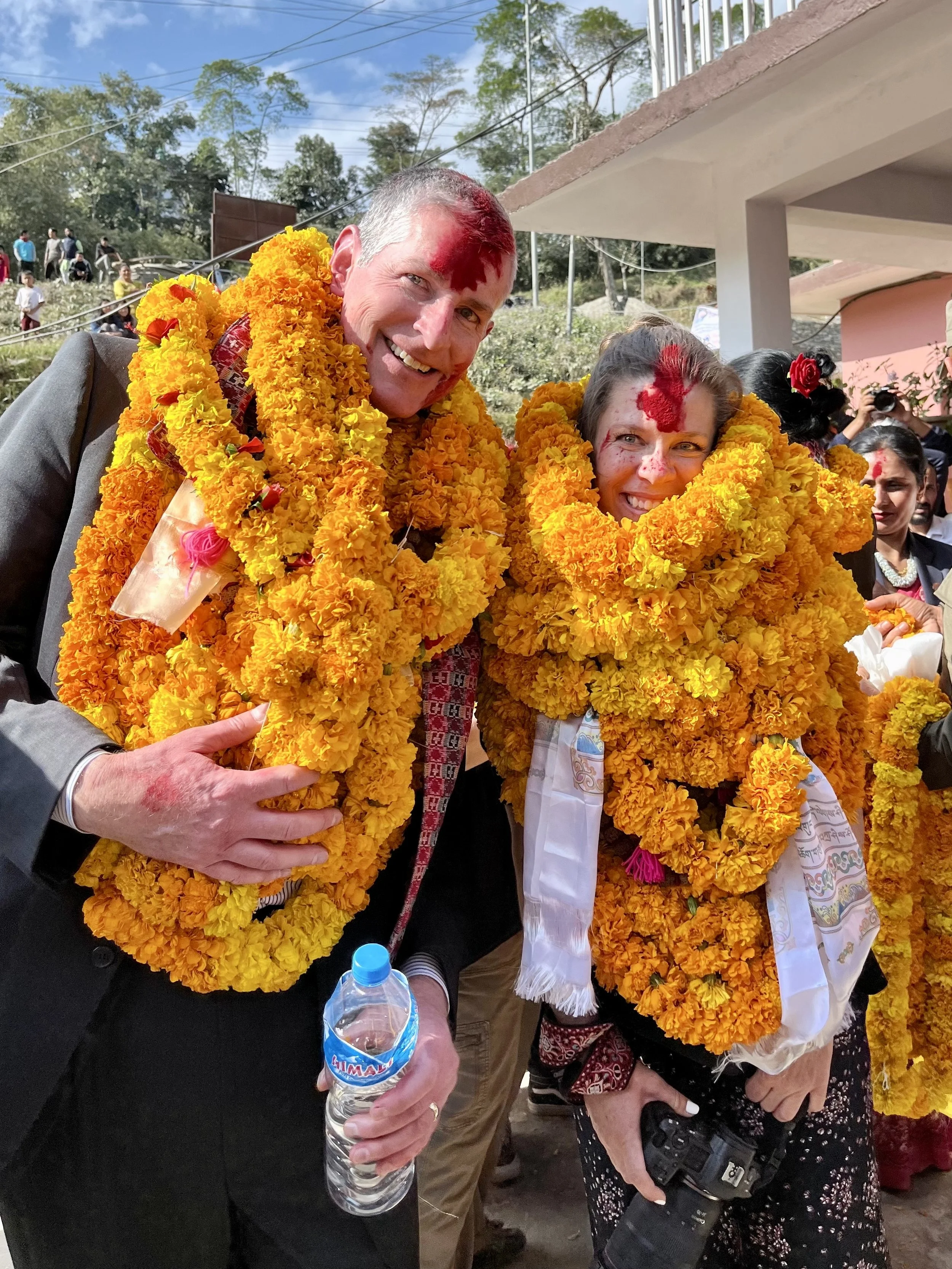 Receiving a warm welcome that included a parade and marigold leis with Mayor Folsom during Superior's first delegatory trip to our sister city in Khandbari, Nepal