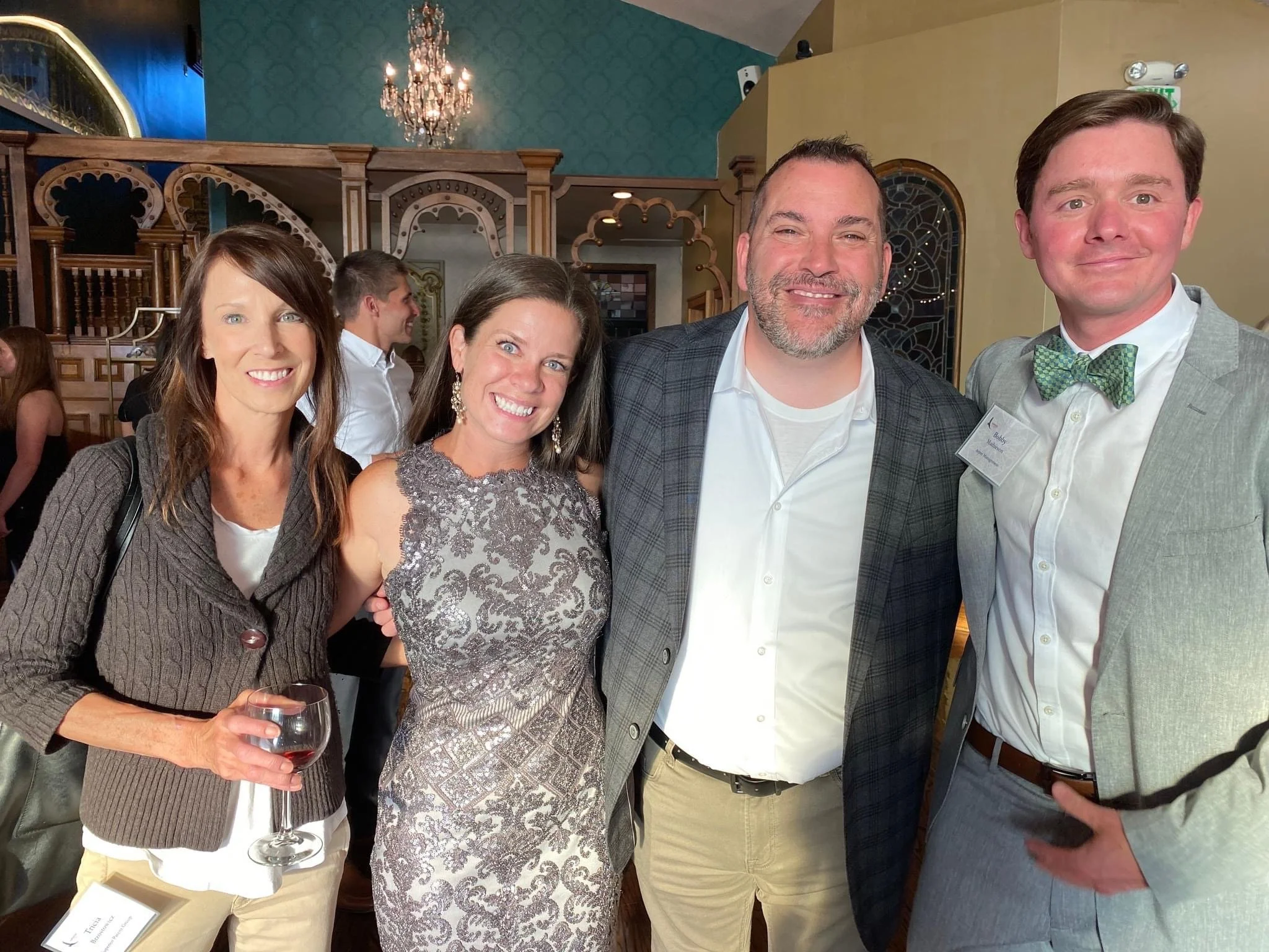 Connecting with local business leaders and community members at the Chamber's annual dinner.