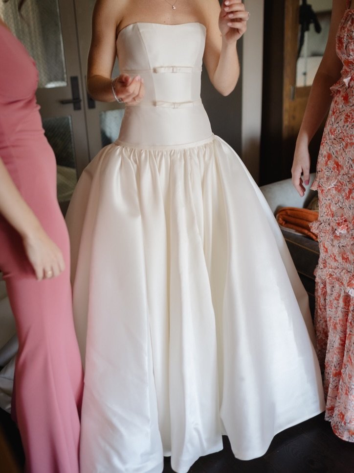 The &lsquo;Jacqueline&rsquo; as shared by the gorgeous bride Julia: 

&ldquo;I went into wedding dress browsing knowing I wanted to feel on my wedding day, but not knowing how that translated into a dress. I wanted to feel timeless and classic, but a