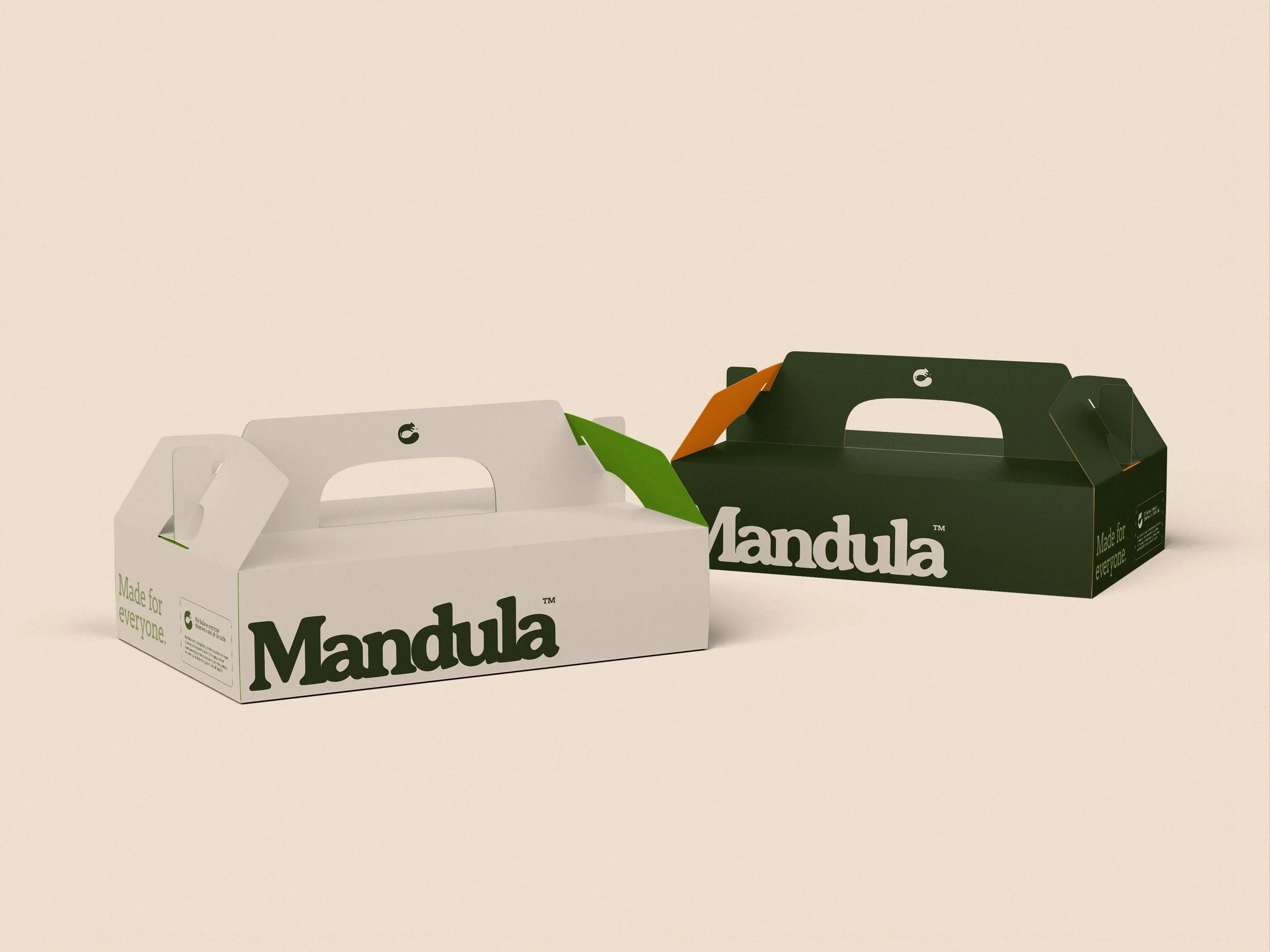 Several eco-friendly cardboard mandala boxes, with one open and one closed, featuring the text "Mandula" and descriptions of their made-for-everyone purpose.