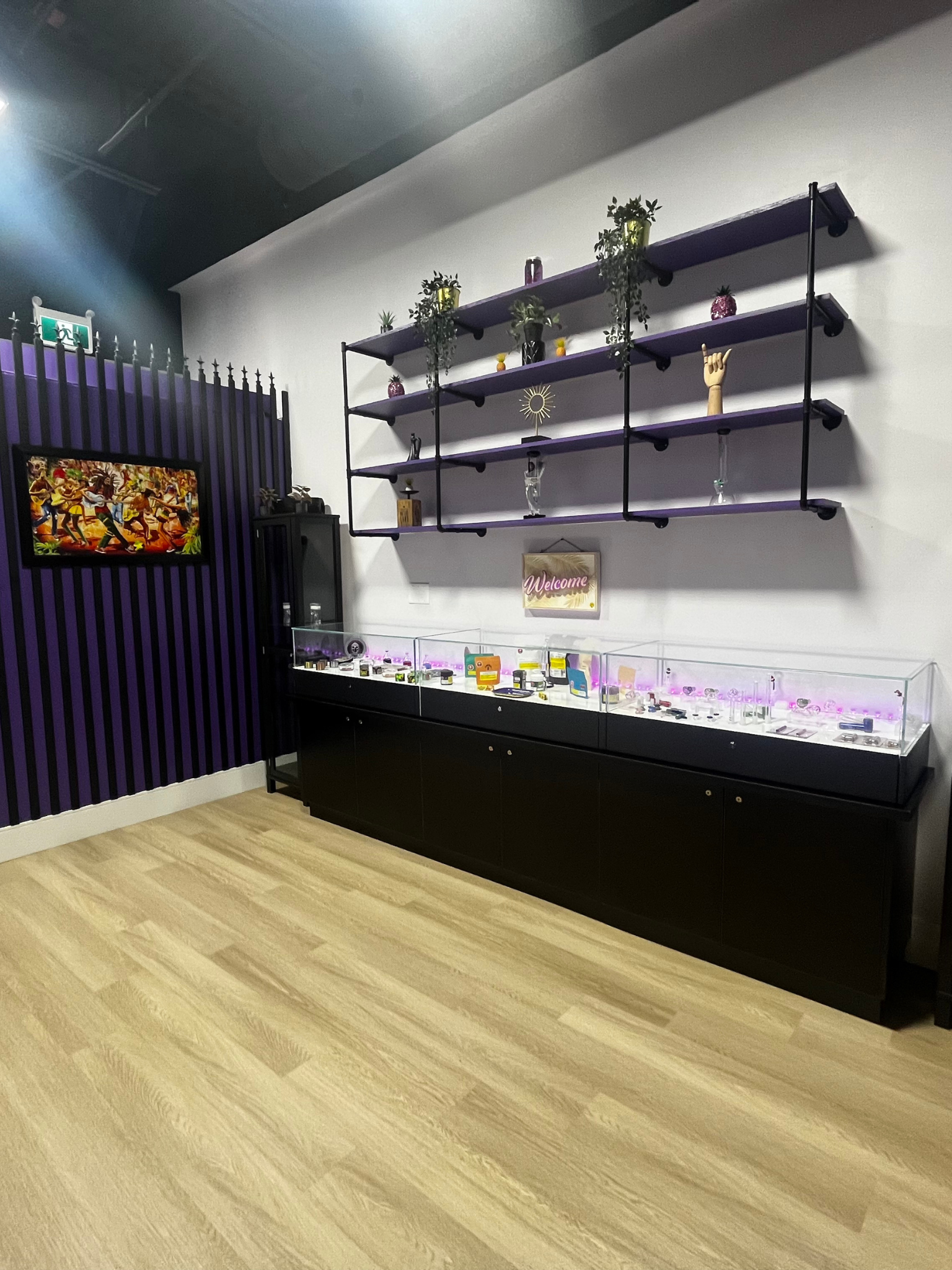 Inside the store view of one of the side walls that have a showcase cabinet and shelves on top of it