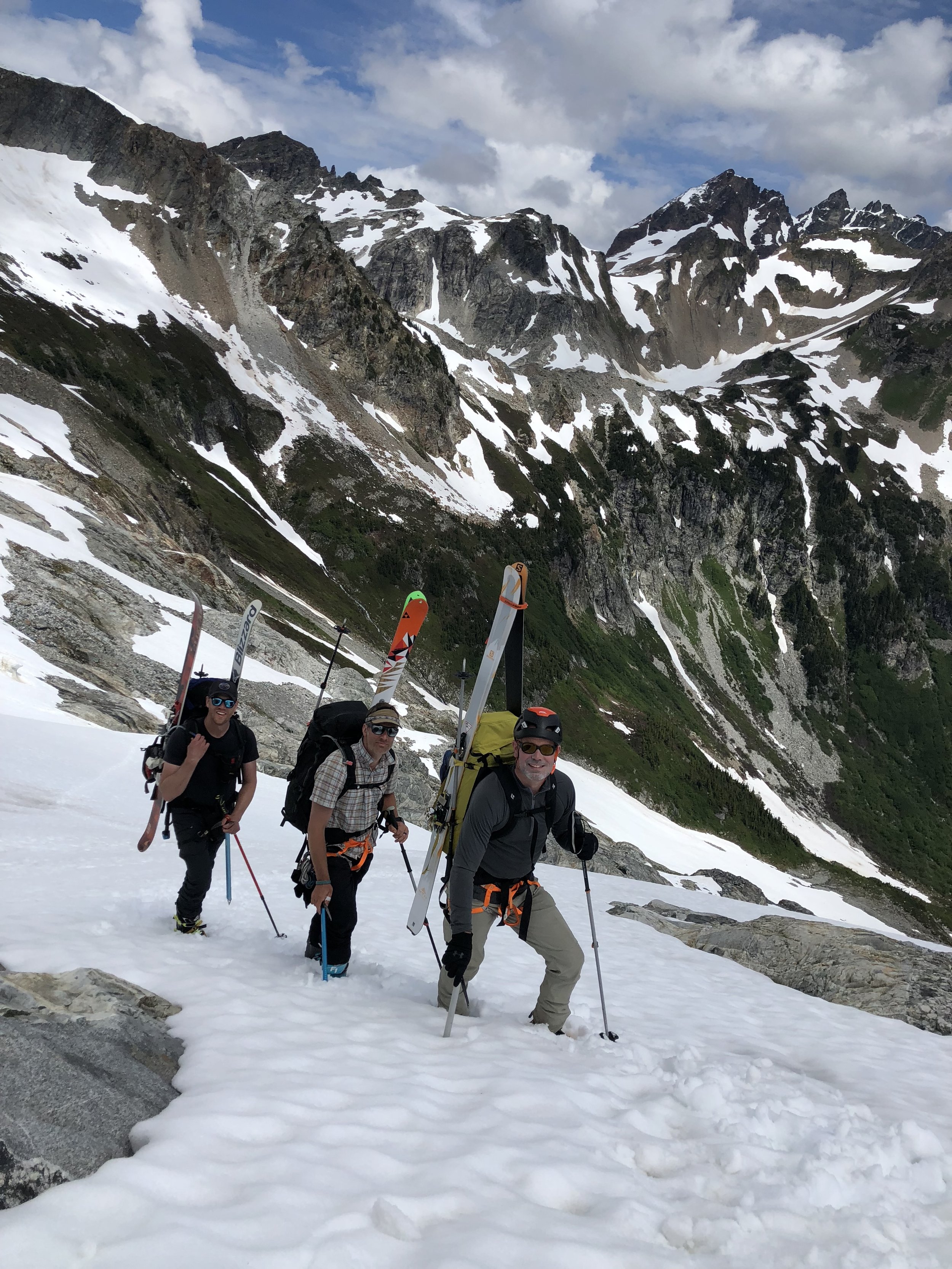Booting above White Rocks Lakes while skiing the Ptarmigan traverse.