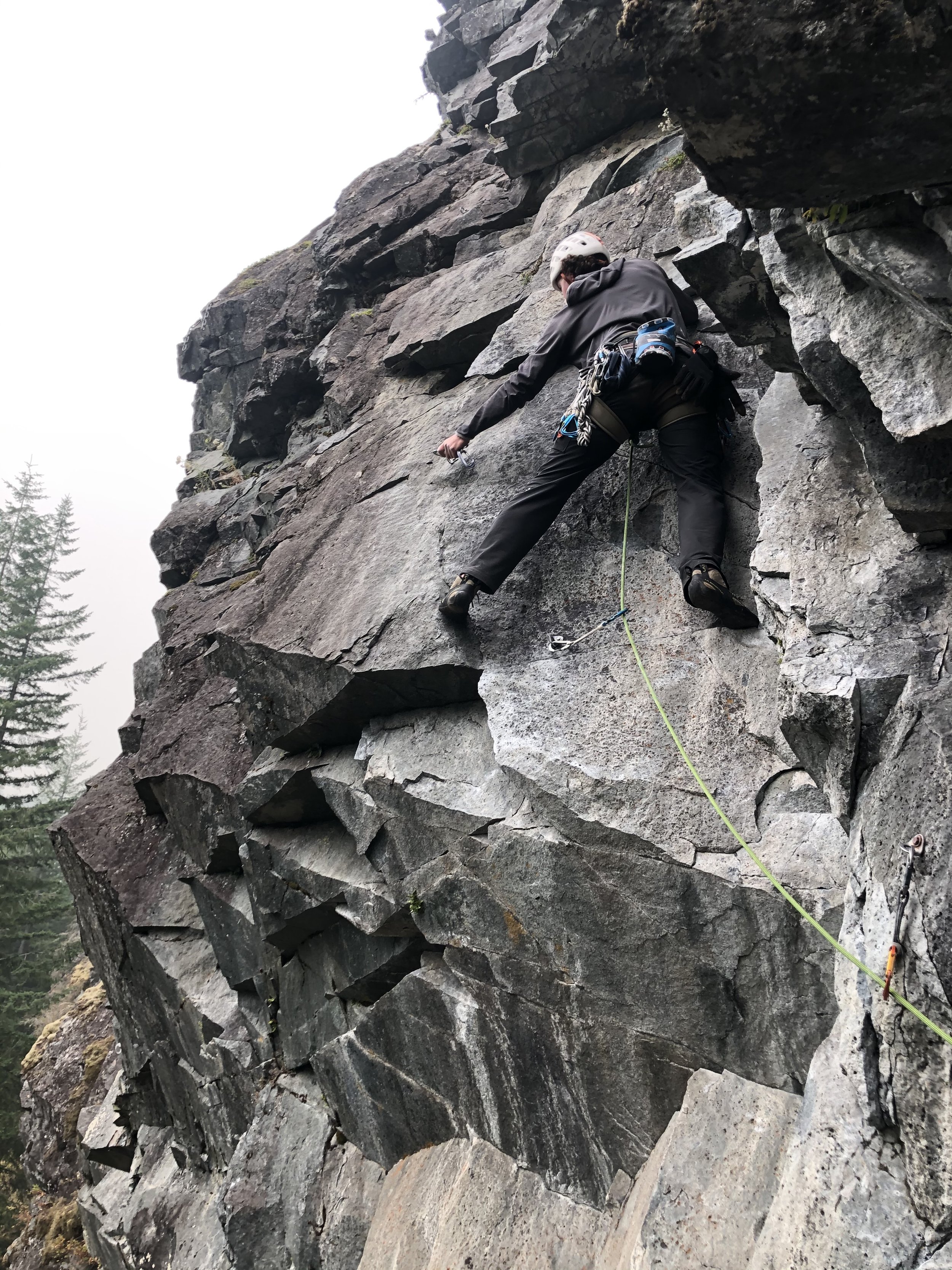 Climbing on the Far side on the 3-pitch "The Plank" at Exit 38 during a Washington Alpine Guides intro to multi pitch clinic.