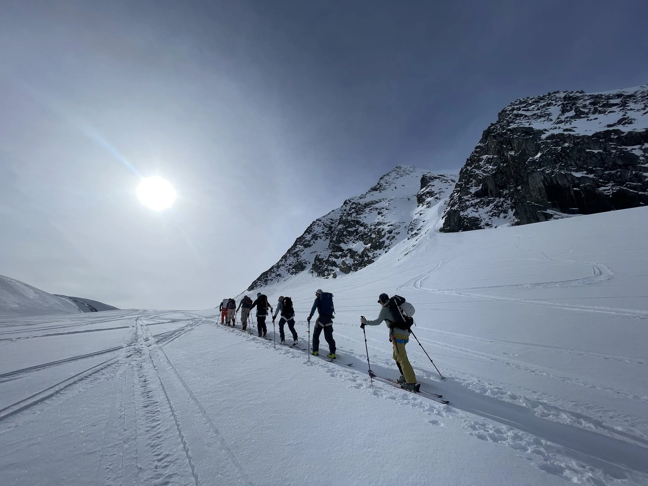 The crew enjoying the views while ski touring around in the Chugach Mountains near Thompson Pass and Valdez, Alaska. Photo by Ian Nicholson