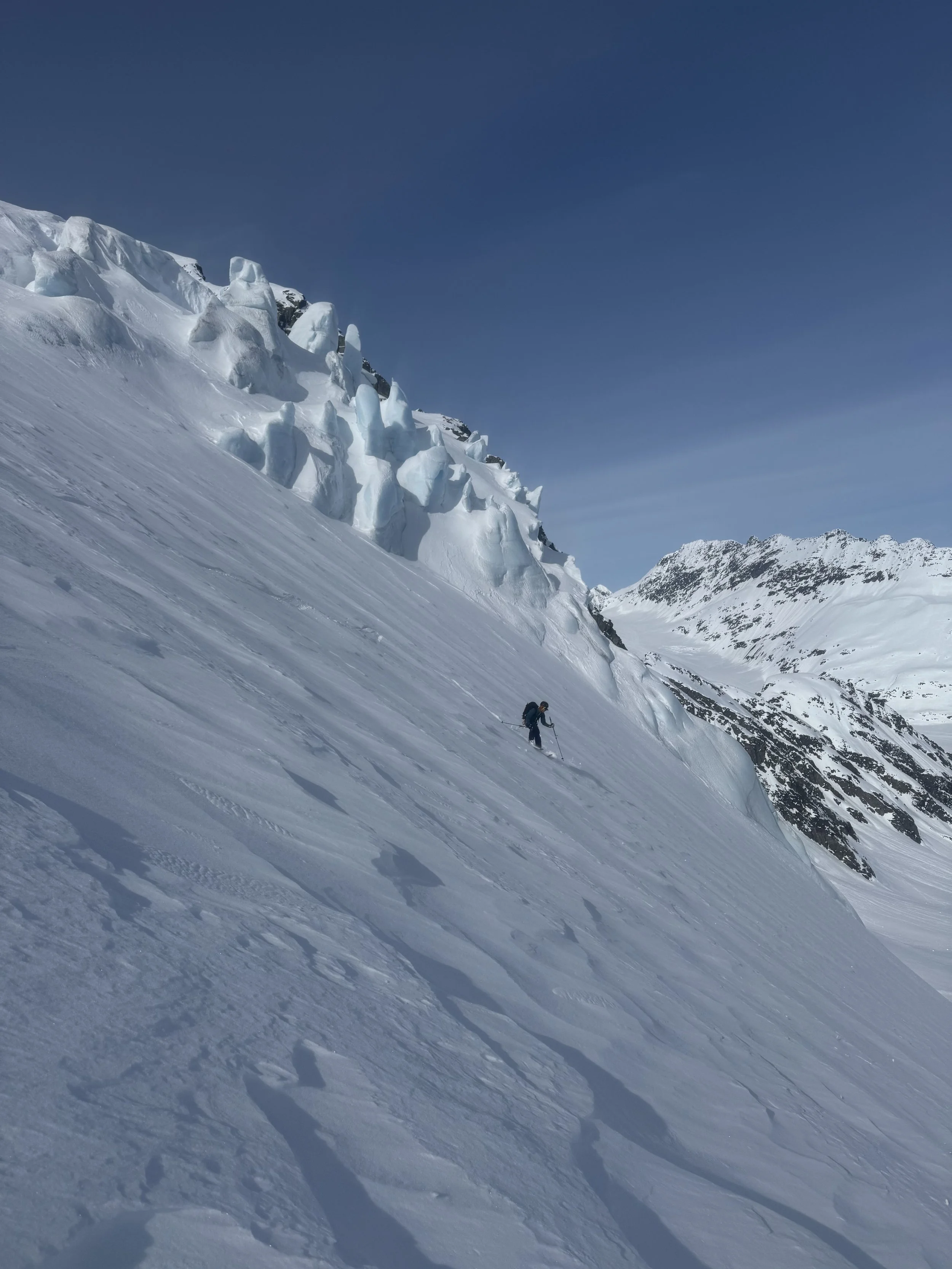Tracey Bernstein skiing the Ice Palace down to the Hoodoo Glacier while ski touring in the Chugach Mountains at Thompson Pass near Valdez, Alaska. Photo by Ian Nicholson
