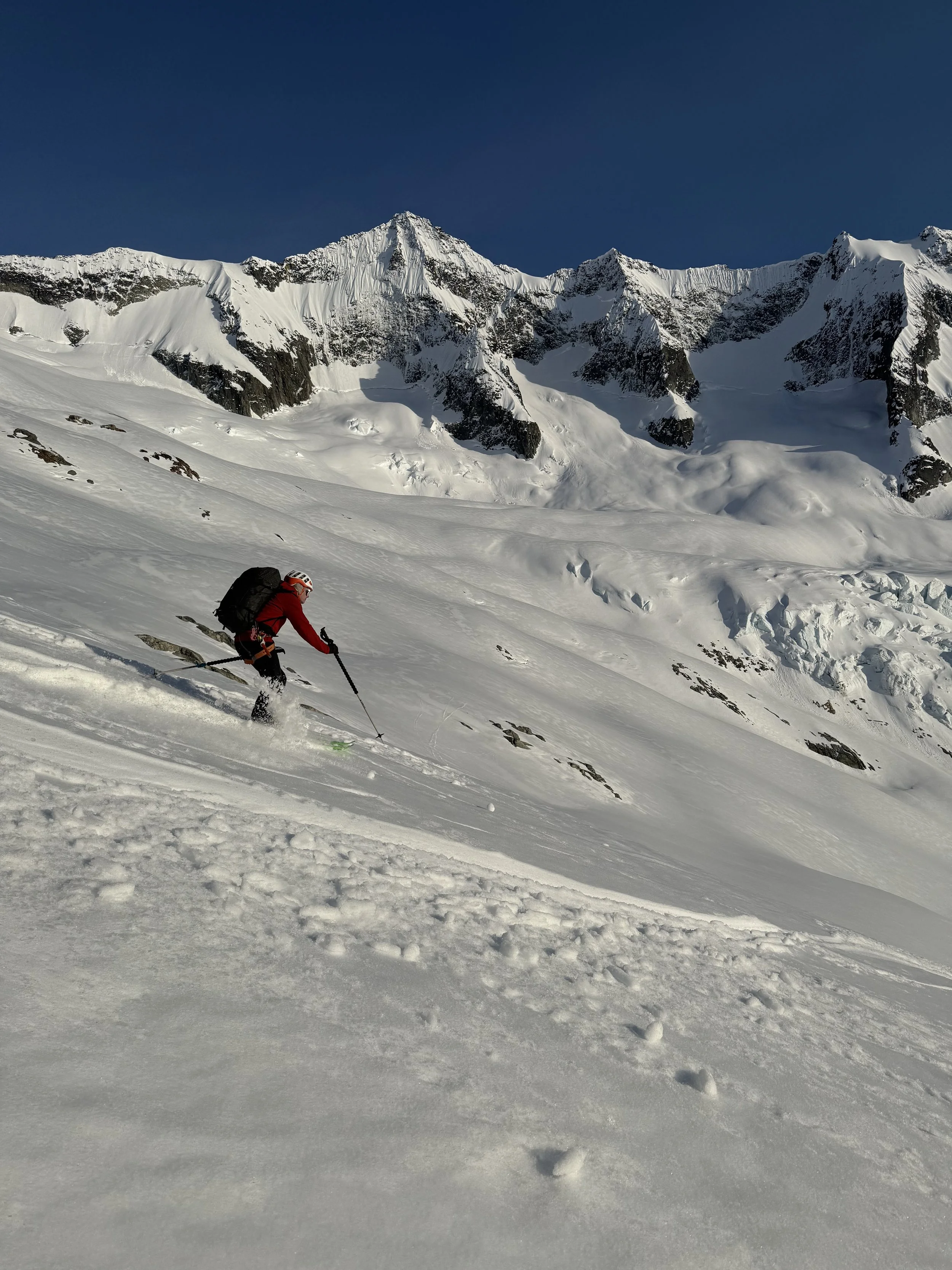 Skiing below Forbidden Peak while skiing the Forbidden Tour, North Cascades WA, Photo by Ian Nicholson
