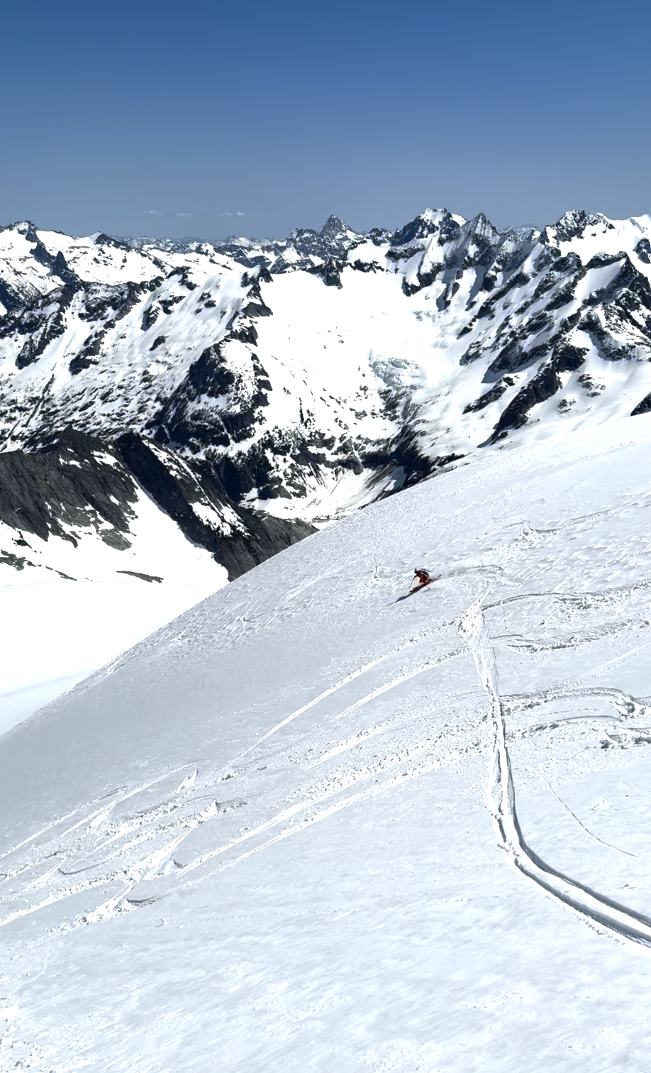 Dropping down the Northeast Face after summiting Eldorado Peak while skiing the Forbidden Tour, North Cascades WA, Photo by Ian Nicholson