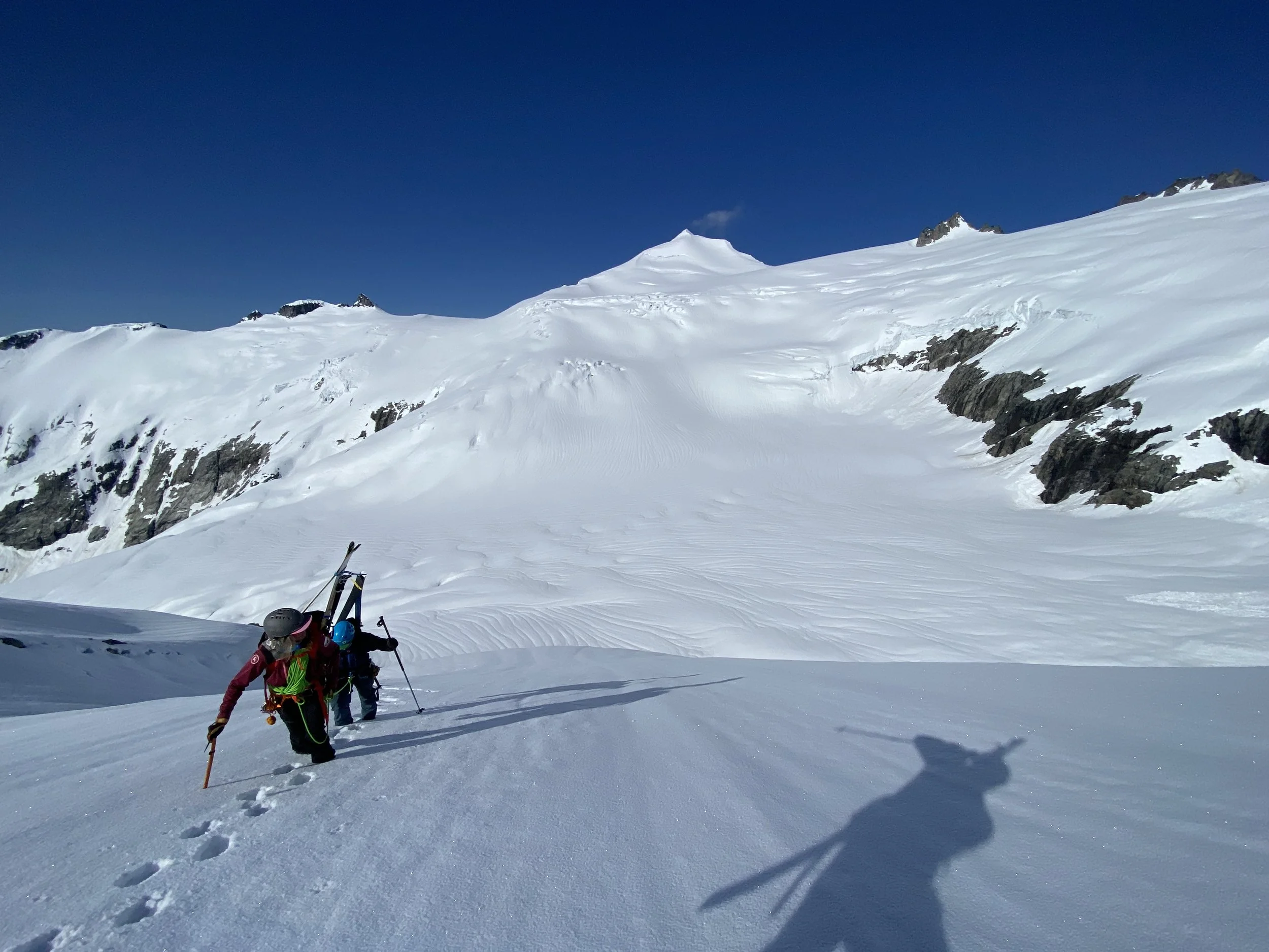 Booting it on the Inspiration ice cap with Eldorado Peak in the background on the Isolation Traverse.  Photo by Ian Nicholson