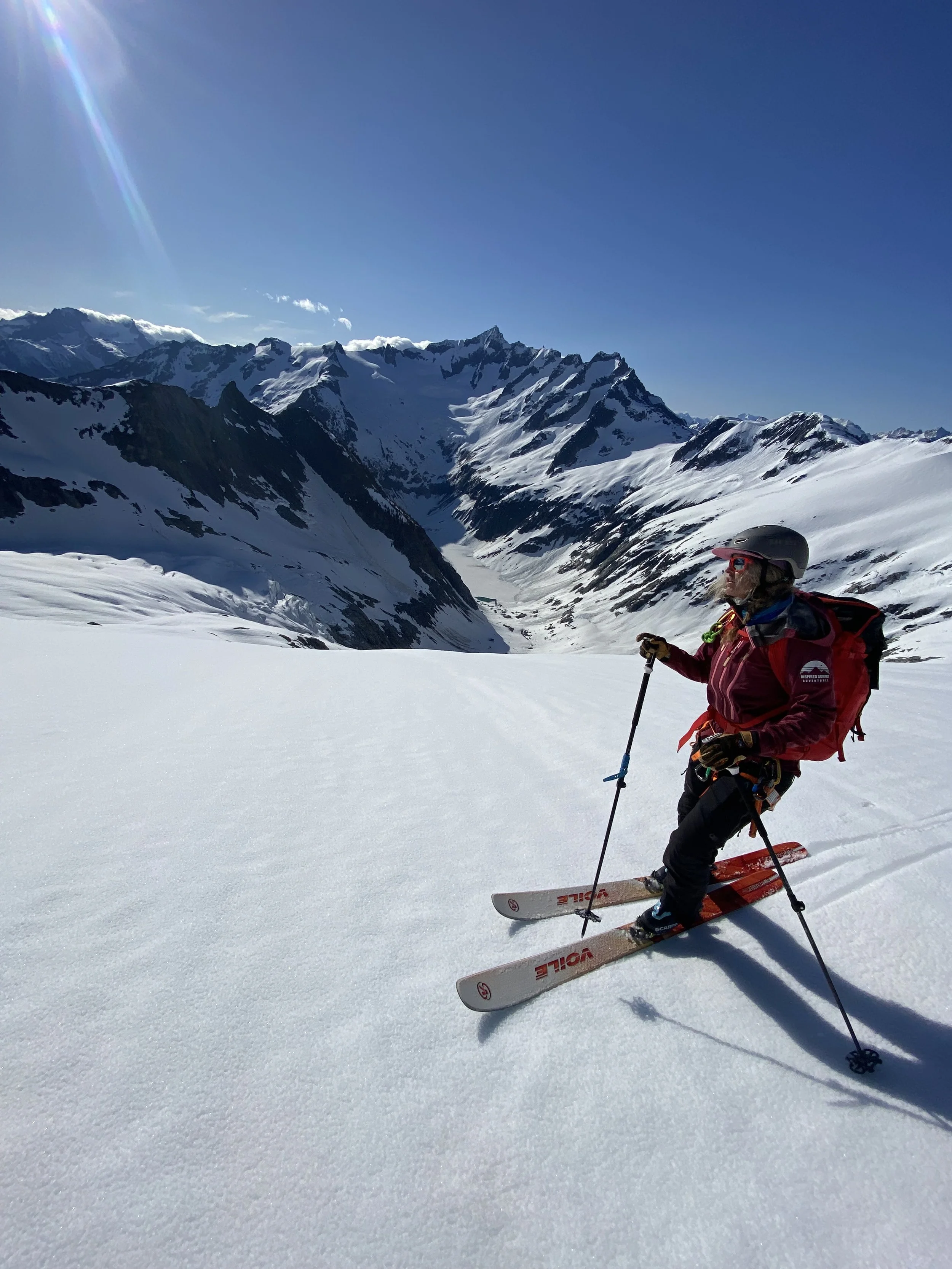 Crossing from the Eldorado Glacier to the Inspiration Glacier starring off at Forbidden Peak on the Isolation Traverse.  Photo by Ian Nicholson