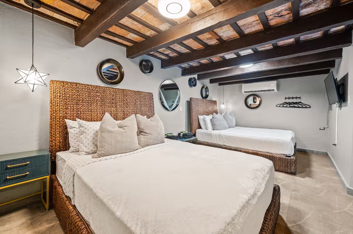 Raise-your-vibe-2025-retreat-dyanara-torres-room.jpeg